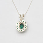 Beautiful 925 Sterling Silver Pendant with a Halo setting, featuring a Natural Emerald, perfect for birthdays and special occasions.