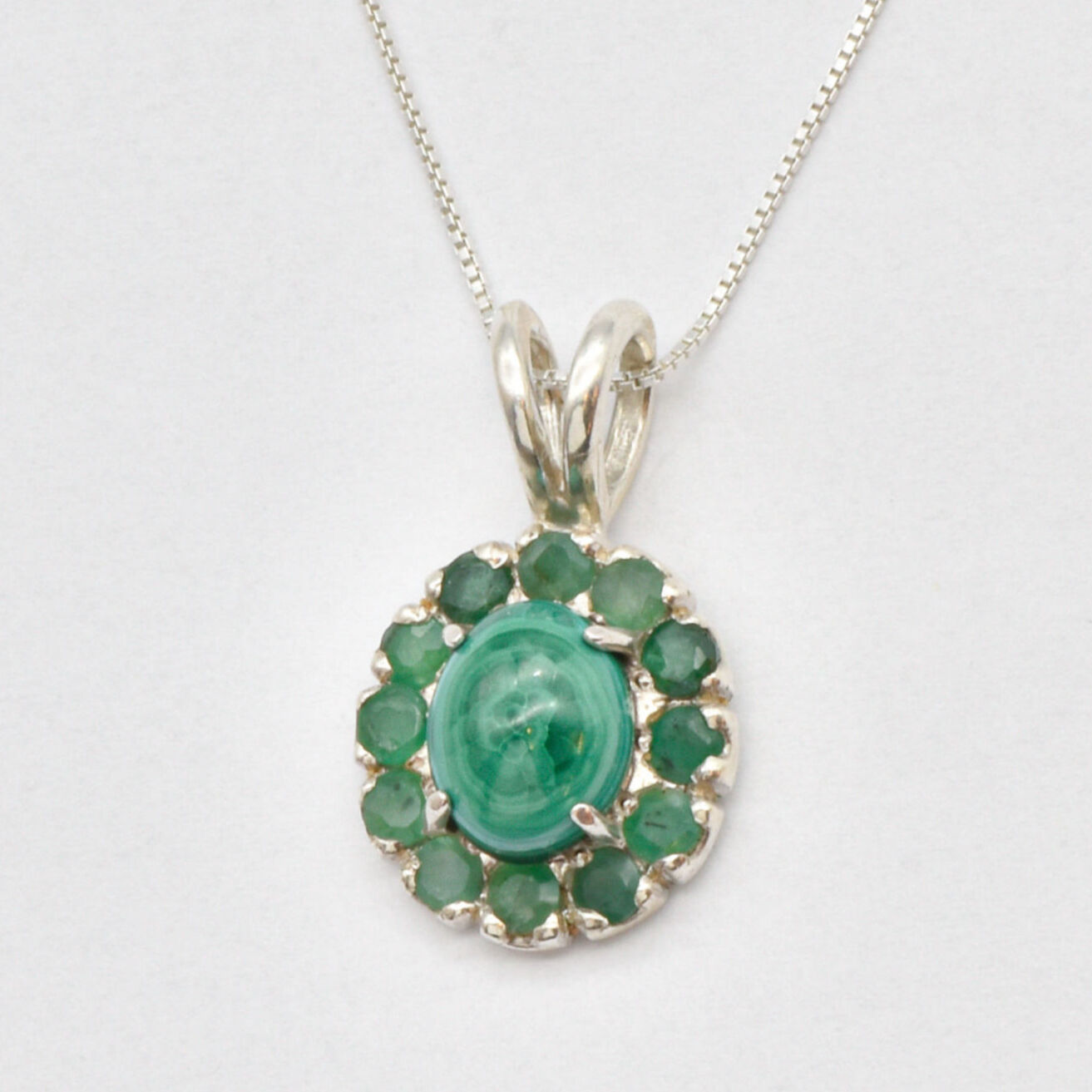 Natural Emerald Pendant made in 925 Sterling Silver with Round Natural Green Emerald in Halo setting, May Birthstone gift idea, symbolizes growth, harmony, and deep emotional healing, ideal for everyday wear and perfect for birthday gifting and special occasions.