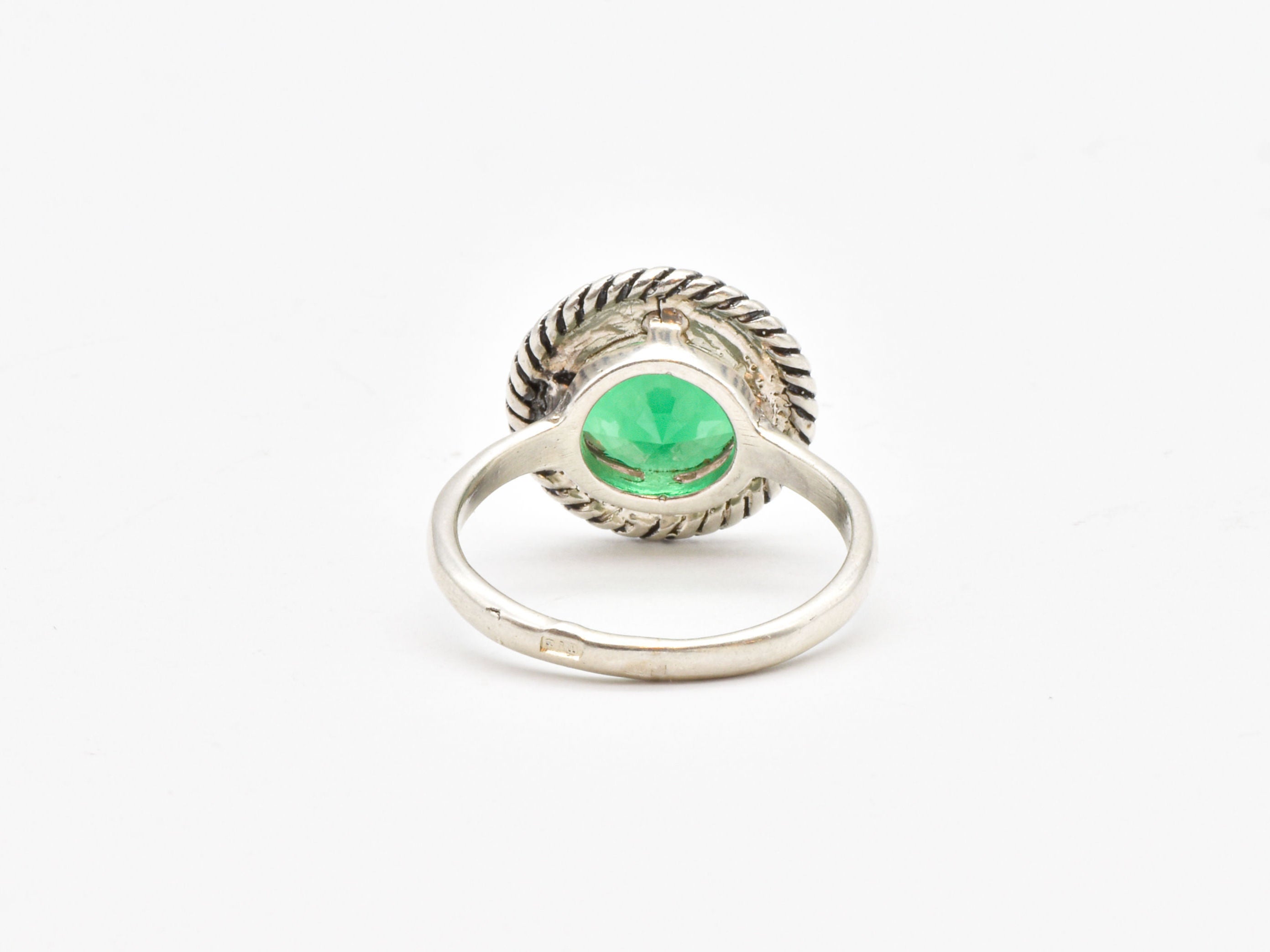 Chic 925 Sterling Silver Ring adorned with a Round Created Green Emerald, a meaningful gift for May birthdays and special occasions.