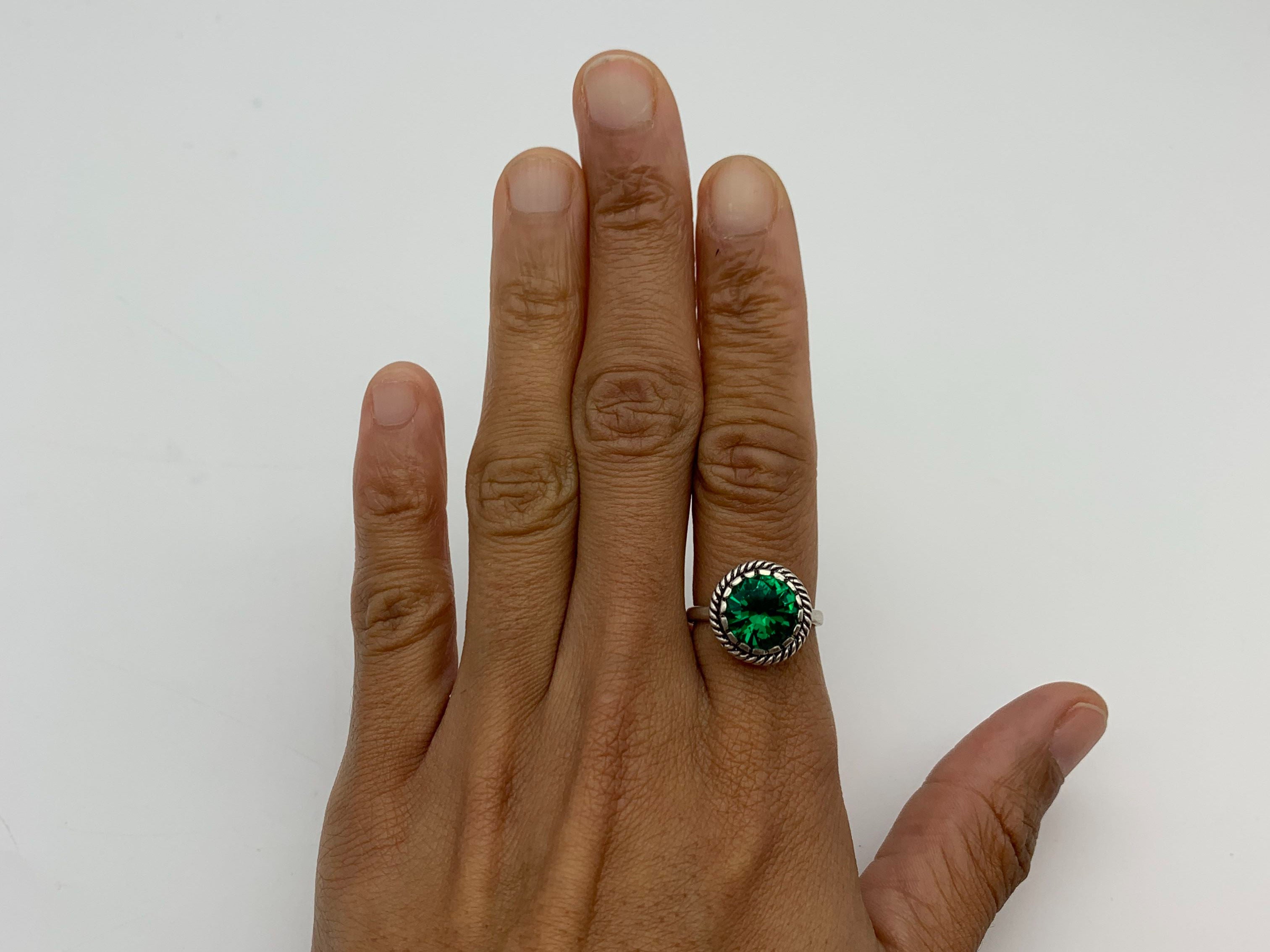 Elegant 925 Sterling Silver Ring showcasing a Round Created Green Emerald, symbolizes love and perfect for May birthdays.