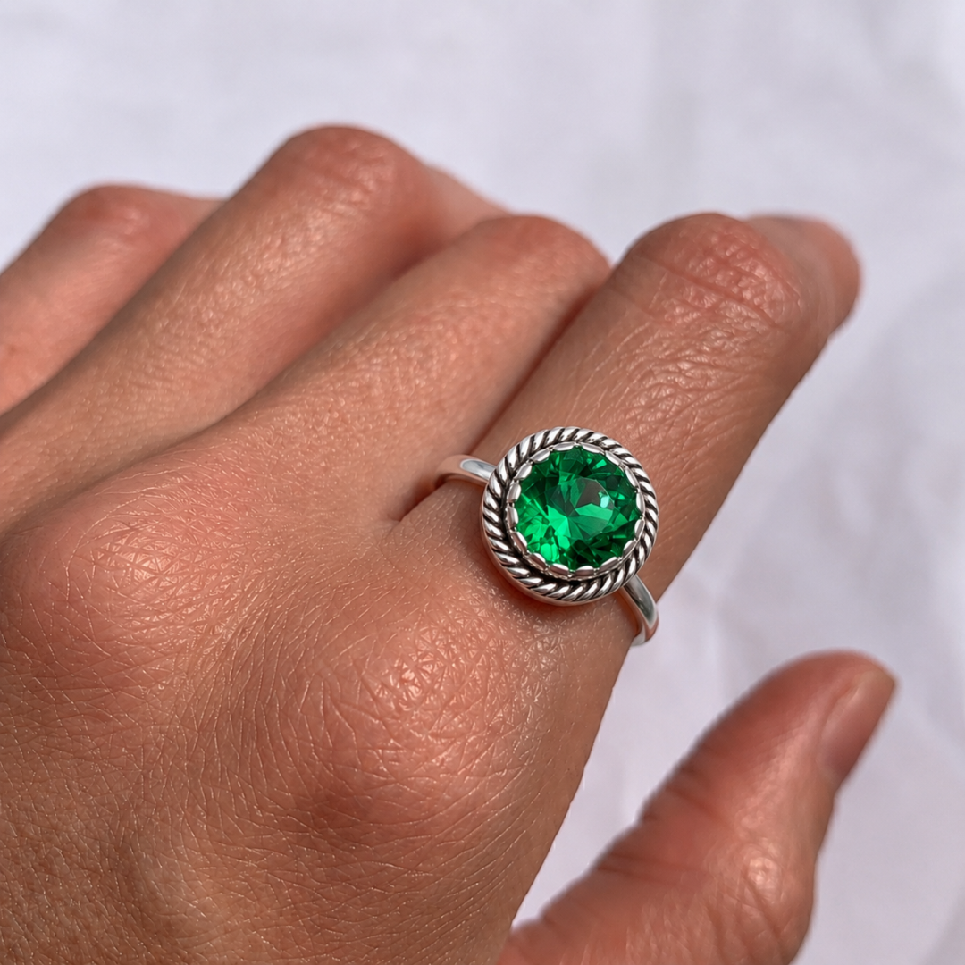 Beautiful 925 Sterling Silver Emerald Ring featuring a Round Created Green Emerald, perfect for birthdays and special occasions.
