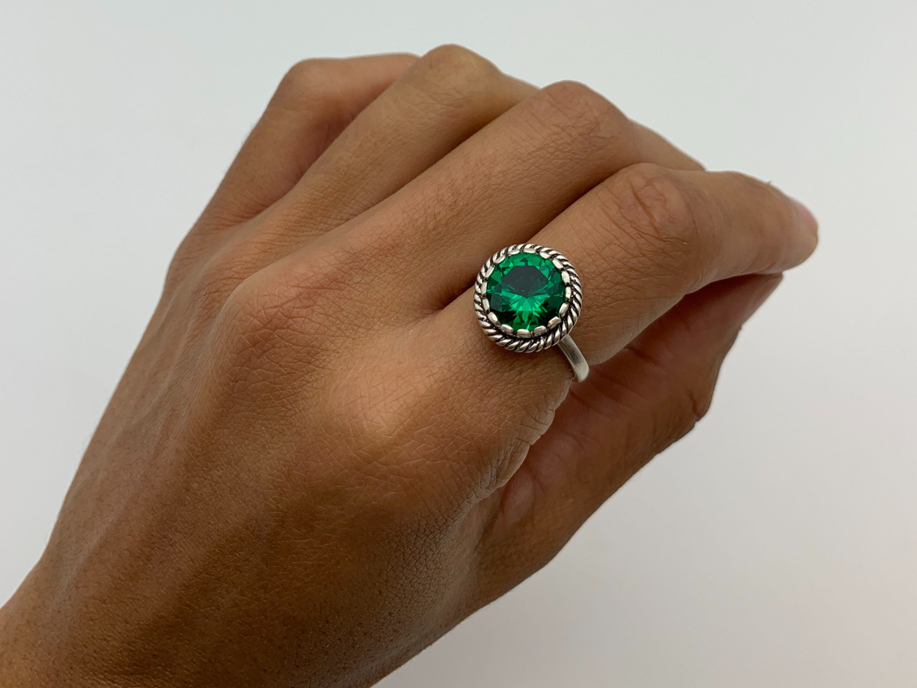 Beautiful 925 Sterling Silver Emerald Ring featuring a Round Created Green Emerald, perfect for birthdays and special occasions.