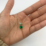 Charming Created Emerald Pendant in 925 Sterling Silver, symbolizes love and renewal, perfect for daily wear and celebrations.
