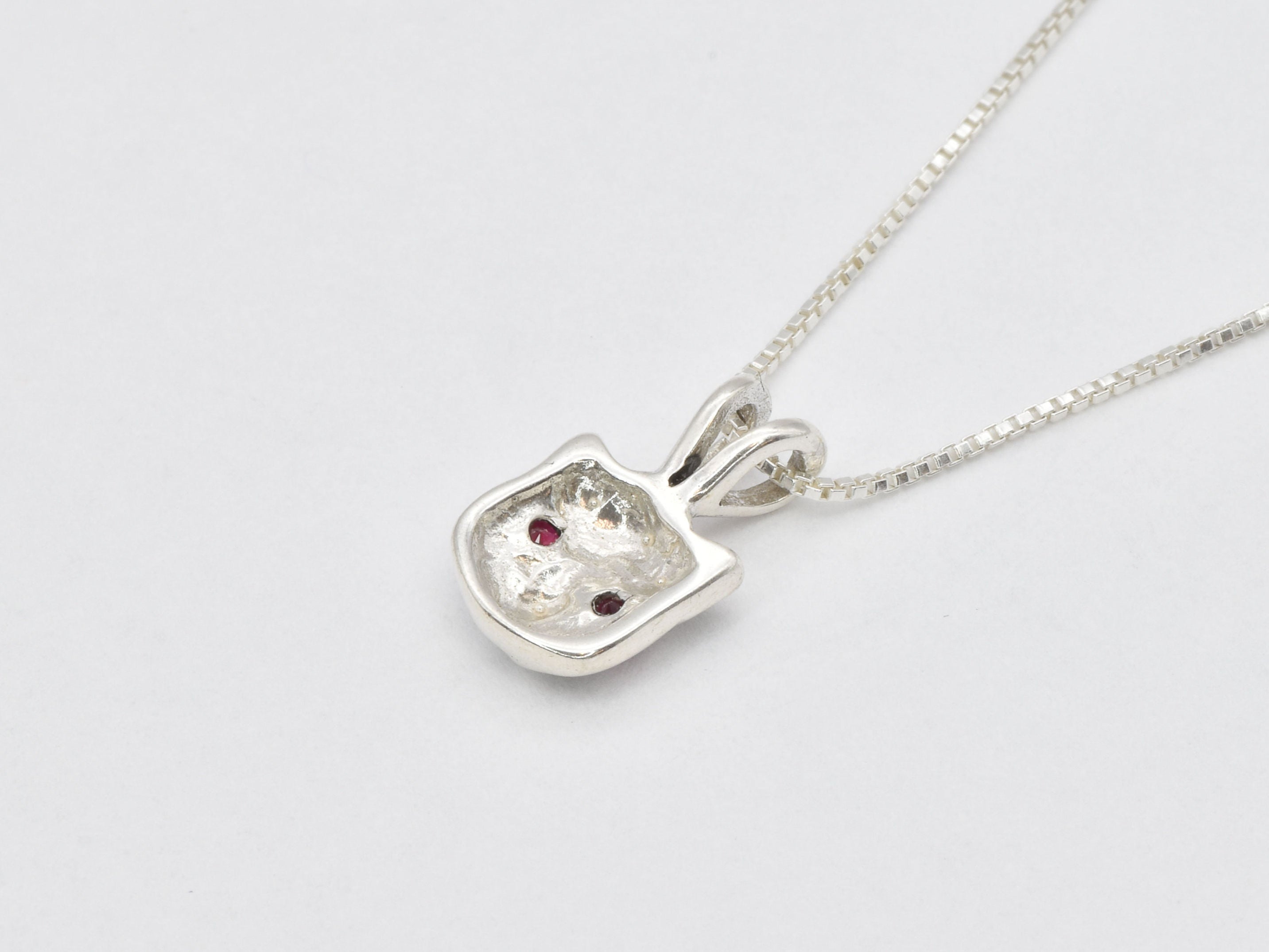 Beautifully crafted Ruby Pendant in 925 Sterling Silver, featuring a Round Created Red Ruby, a luxurious gift for July birthdays.