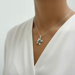Charming Plumeria Flower Pendant in 925 Sterling Silver, perfect for adding a touch of Hawaiian beauty to any outfit.