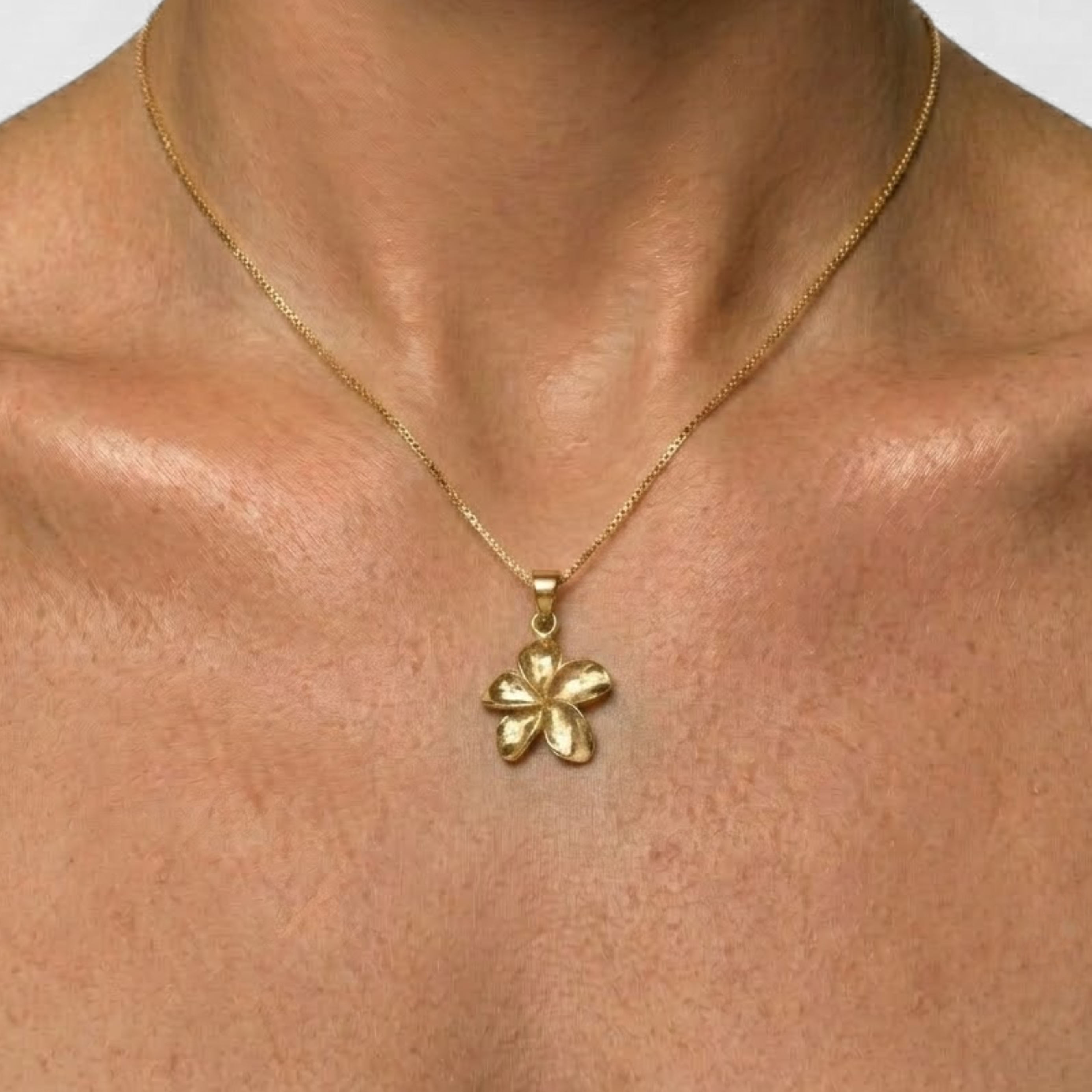 Hawaiian Gold Plumeria Pendant Necklace, crafted in 18k Gold Vermeil, perfect for casual wear and special celebrations.