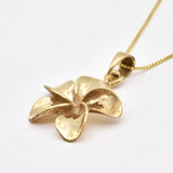 Elegant Gold Flower Pendant Necklace featuring a plumeria design, made from 18k Gold Vermeil for everyday elegance and gifting.