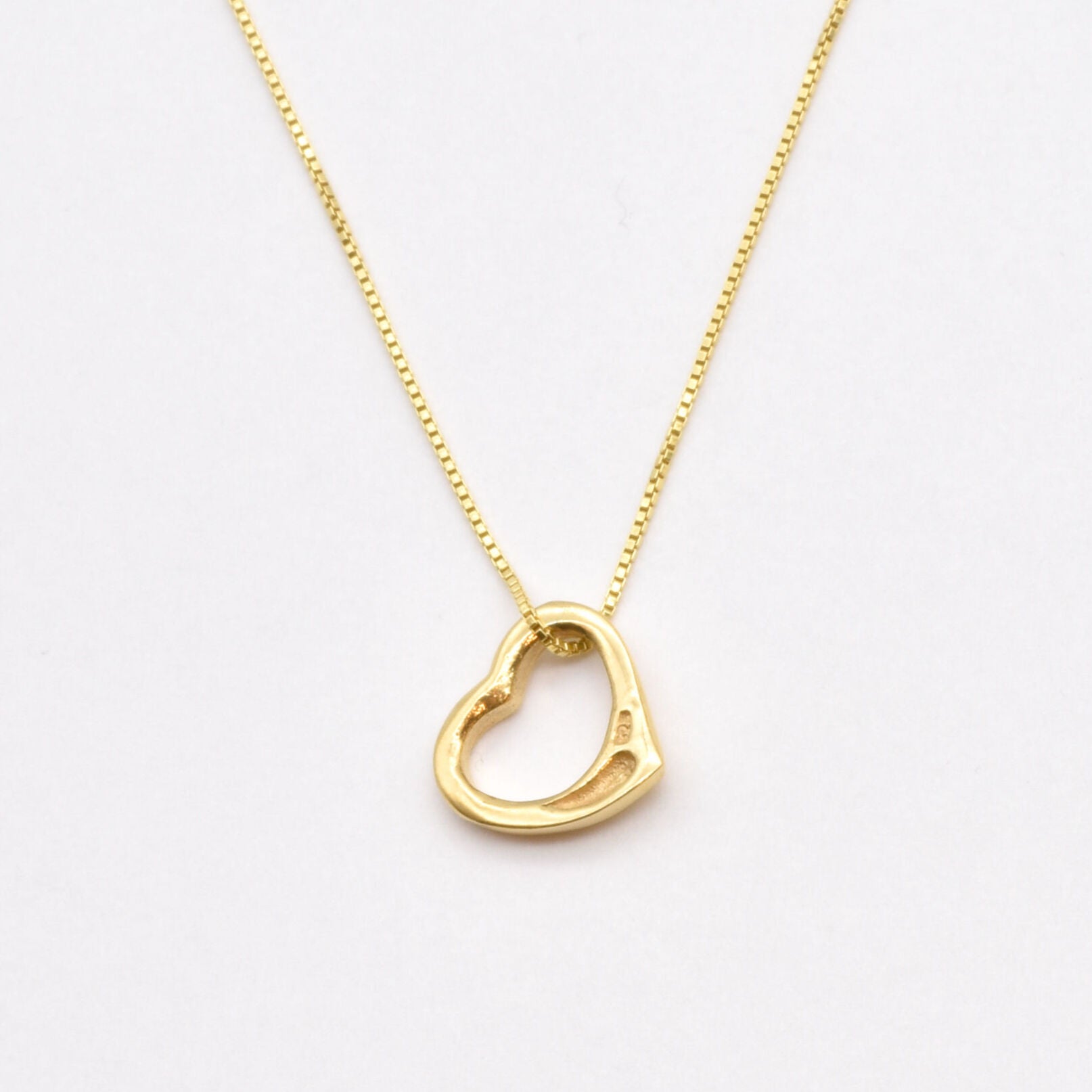 Gorgeous Gold Heart Necklace showcasing an Open Heart Pendant, made from 18k Gold Vermeil. Ideal for everyday elegance and gifting.