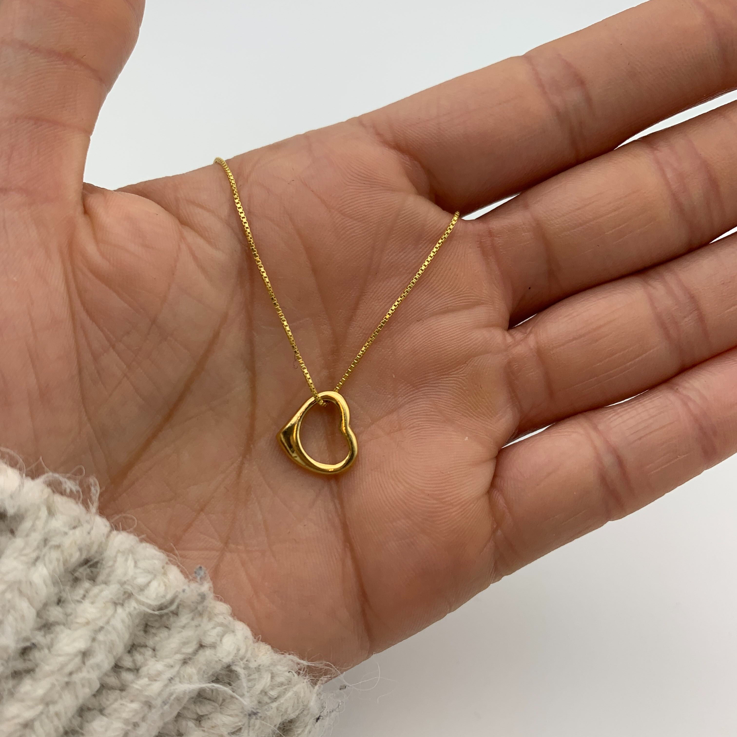 Stunning Gold Heart Necklace with a delicate Open Heart Pendant, designed in 18k Gold Vermeil. A lovely gift for any occasion.