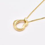 Chic Gold Heart Necklace featuring an Open Heart Charm Pendant, made of 18k Gold Vermeil. Great for special occasions and daily use.