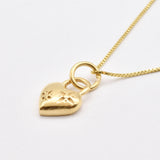 Elegant Gold Heart Pendant Necklace with a unique heart lock design, ideal for gifting and enhancing your everyday look.