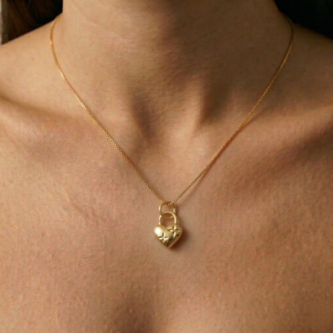 Gold Heart Pendant Necklace featuring a charming heart lock design, perfect for daily wear and special celebrations.