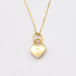 Dazzling Gold Heart Pendant Necklace with a heart lock motif, crafted from 18k Gold Vermeil for daily elegance and memorable gifting.