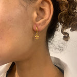 Beautiful 18k Gold Vermeil earrings with prong-set red rubies, a timeless piece for any jewelry collection and special celebrations.