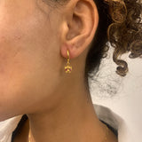 Beautiful 18k Gold Vermeil earrings with prong-set red rubies, a timeless piece for any jewelry collection and special celebrations.