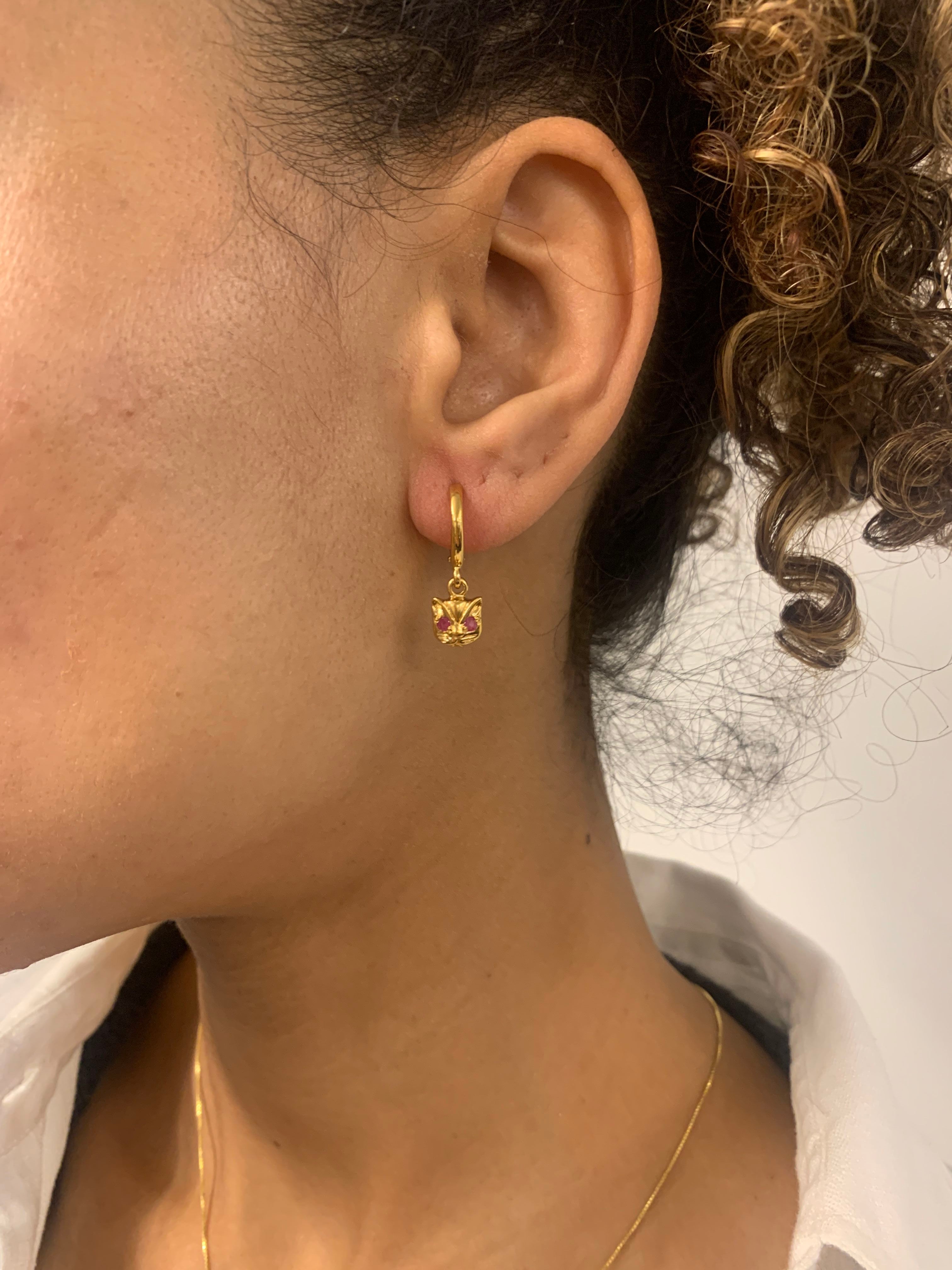 Beautiful 18k Gold Vermeil earrings with prong-set red rubies, a timeless piece for any jewelry collection and special celebrations.