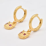 Stunning 18k Gold Vermeil Earrings with round natural red rubies, ideal for elevating everyday style and celebrating special moments.