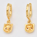 Charming 18k Gold Vermeil Earrings with natural round red rubies, symbolize love and are stylish for any occasion.