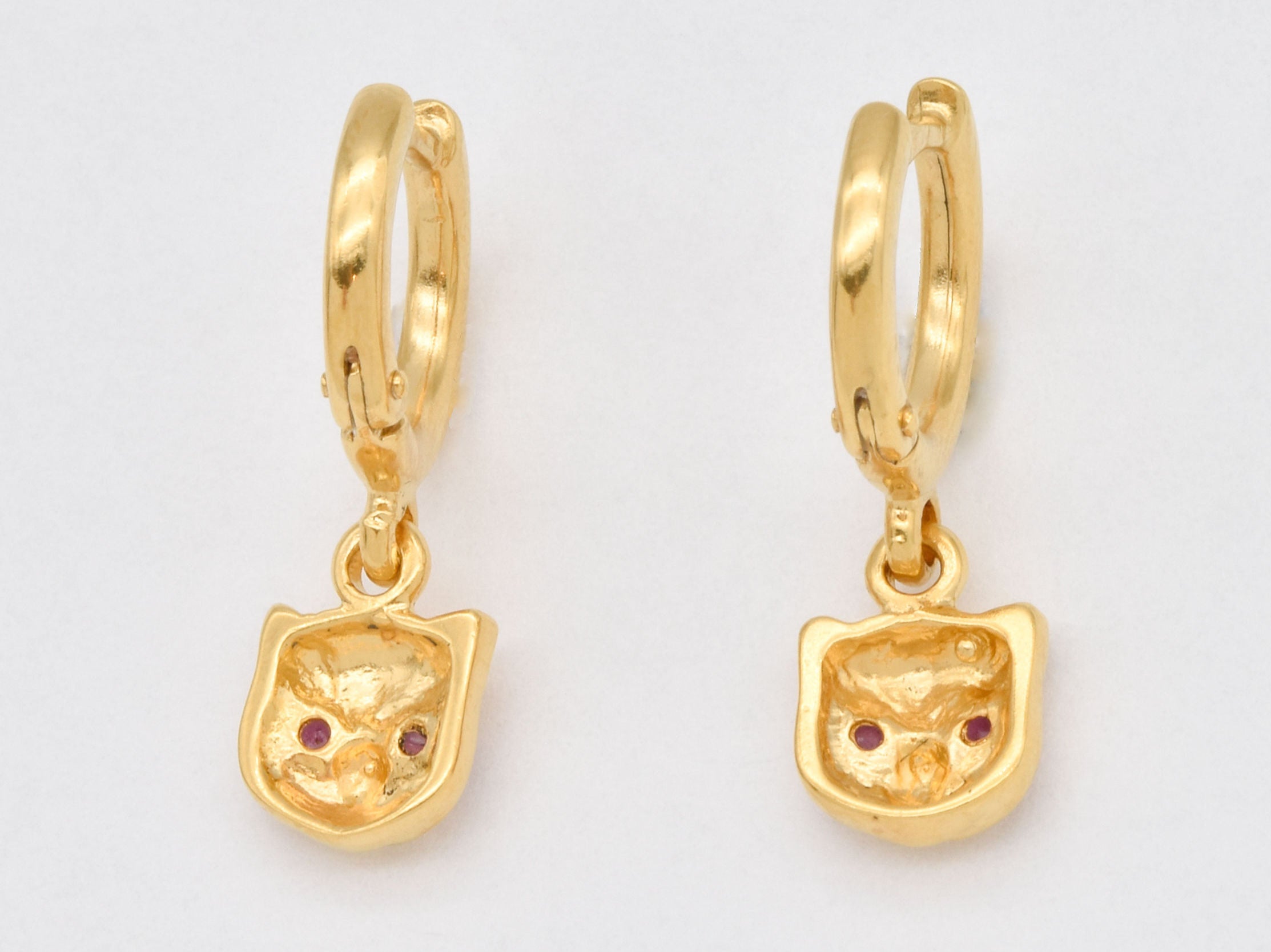 Charming 18k Gold Vermeil Earrings with natural round red rubies, symbolize love and are stylish for any occasion.