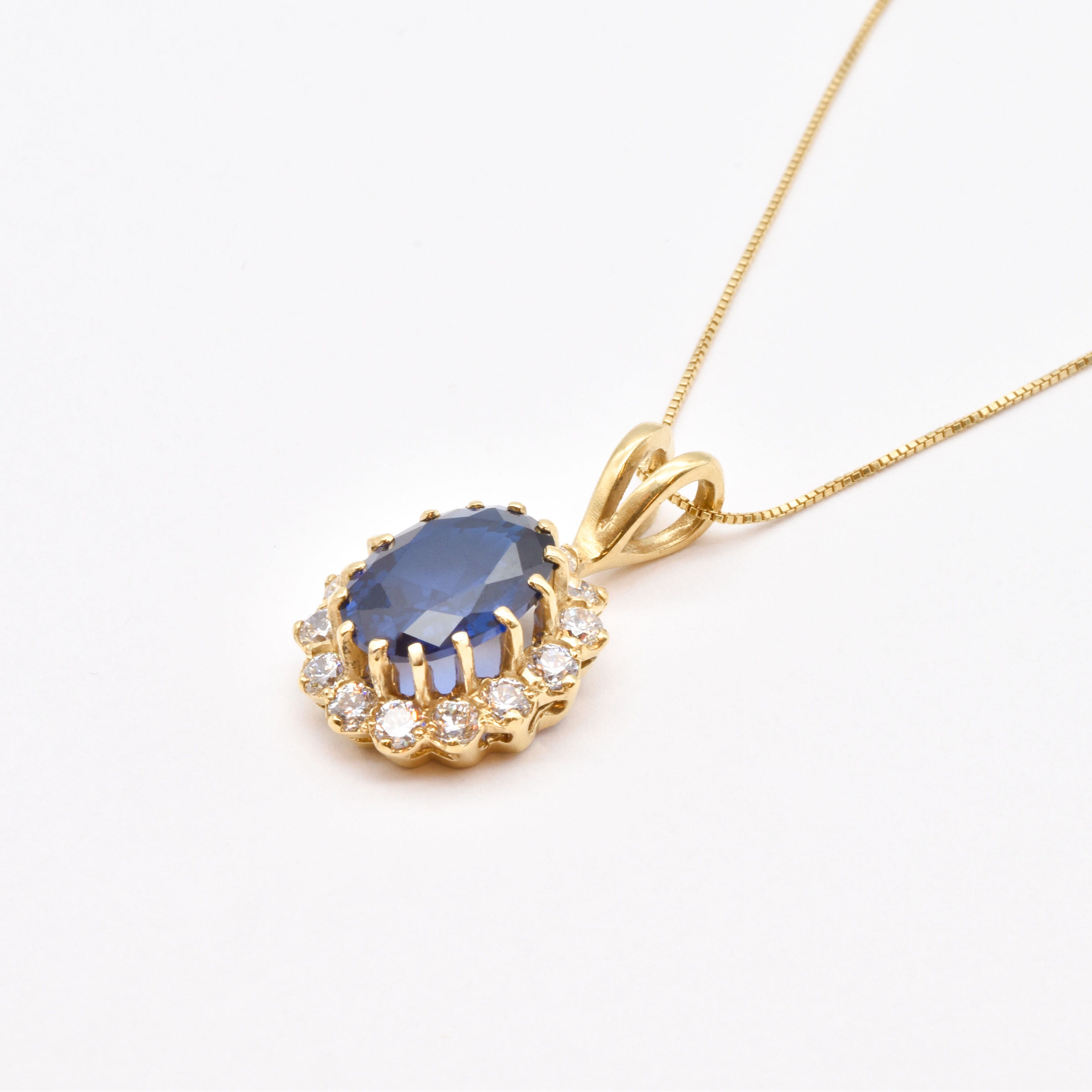 Sapphire Pendant in 18k Gold Vermeil, Halo design with Created Blue Sapphire, perfect for birthdays and everyday elegance.