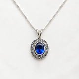 Created Sapphire Pendant made in 925 Sterling Silver with Baguette Created Blue Sapphire in Bezel setting, September Birthstone gift idea, symbolizes sincerity, truth, and faithfulness, ideal for everyday wear and perfect for birthday gifting and special occasions.