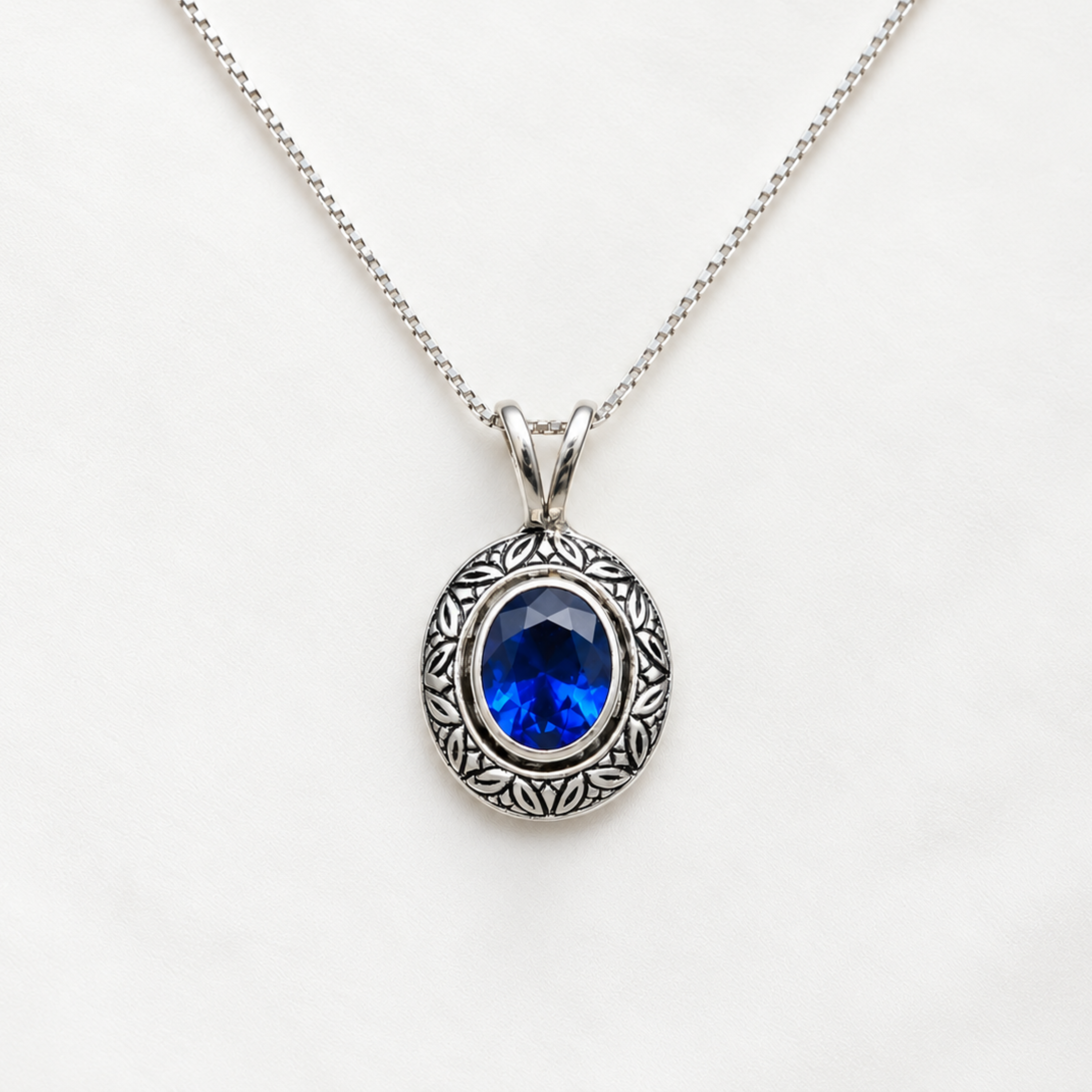 Created Sapphire Pendant made in 925 Sterling Silver with Baguette Created Blue Sapphire in Bezel setting, September Birthstone gift idea, symbolizes sincerity, truth, and faithfulness, ideal for everyday wear and perfect for birthday gifting and special occasions.