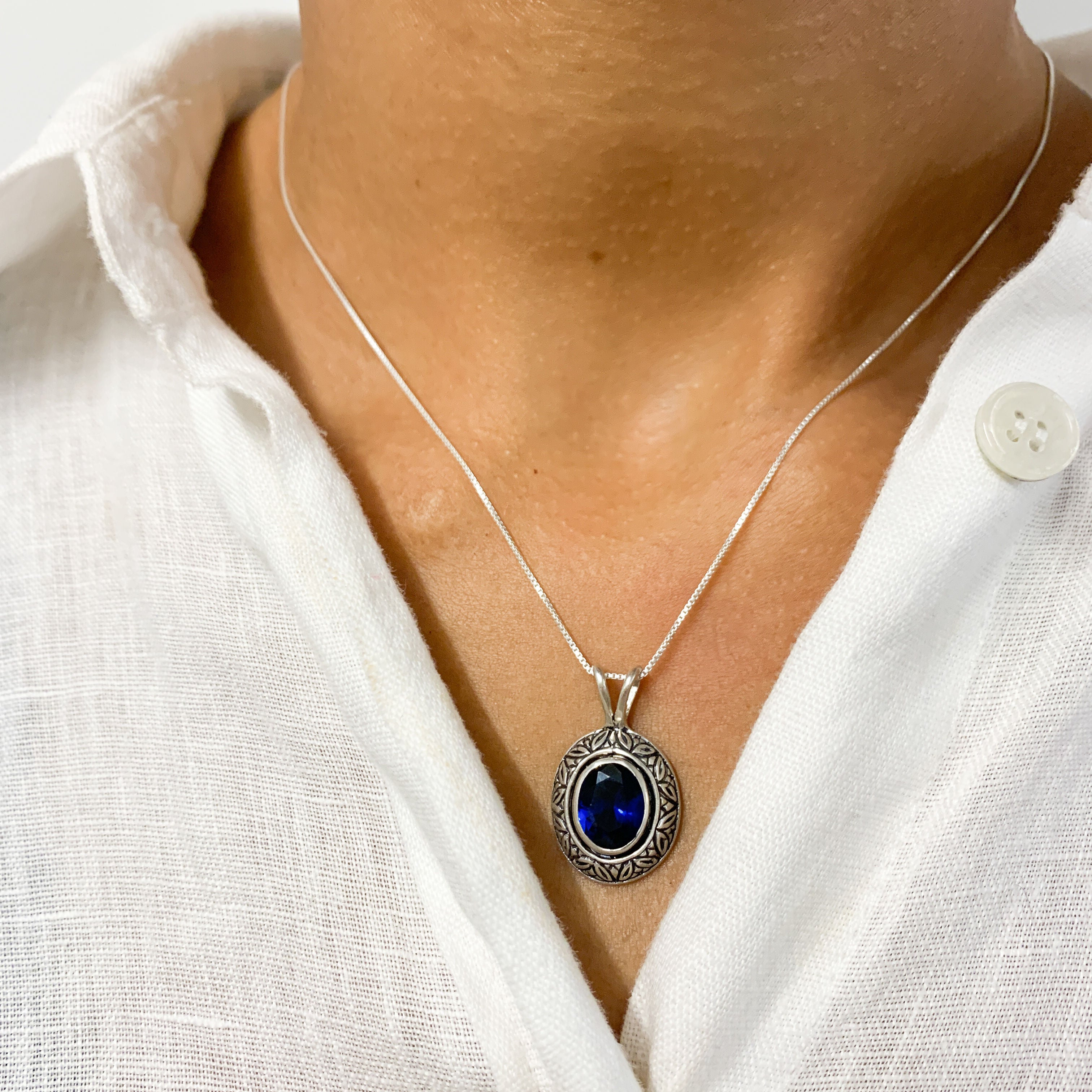 Sapphire Pendant in 925 Sterling Silver with Baguette Blue Sapphire, perfect September birthstone gift for special occasions.