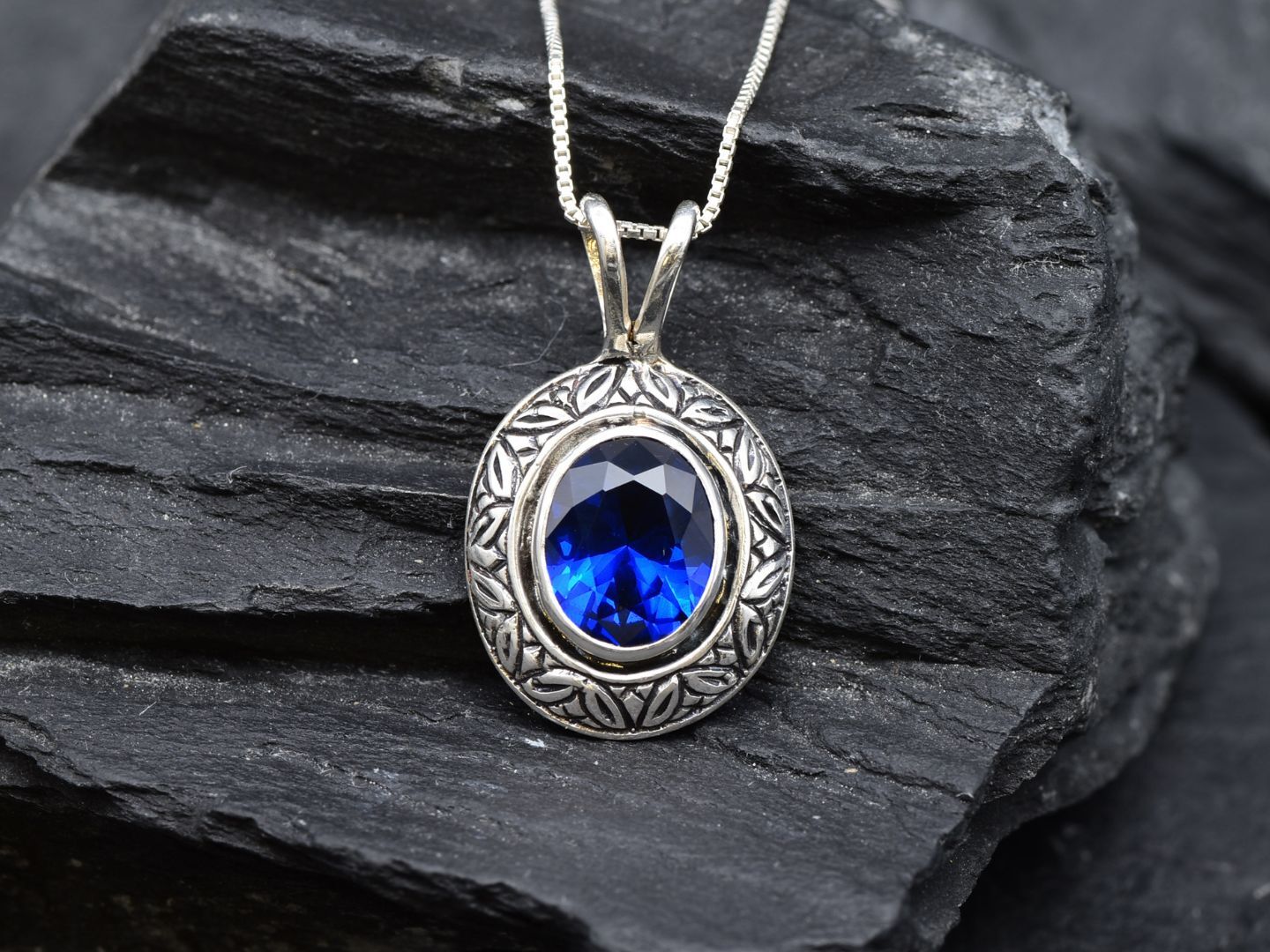 Created Sapphire Pendant made in 925 Sterling Silver with Baguette Created Blue Sapphire in Bezel setting, September Birthstone gift idea, symbolizes sincerity, truth, and faithfulness, ideal for everyday wear and perfect for birthday gifting and special occasions.