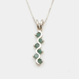 Natural Emerald Pendant made in 925 Sterling Silver with Round Natural Green Emerald in Channel-Set setting, May Birthstone gift idea, symbolizes growth, harmony, and deep emotional healing, ideal for everyday wear and perfect for birthday gifting and special occasions.