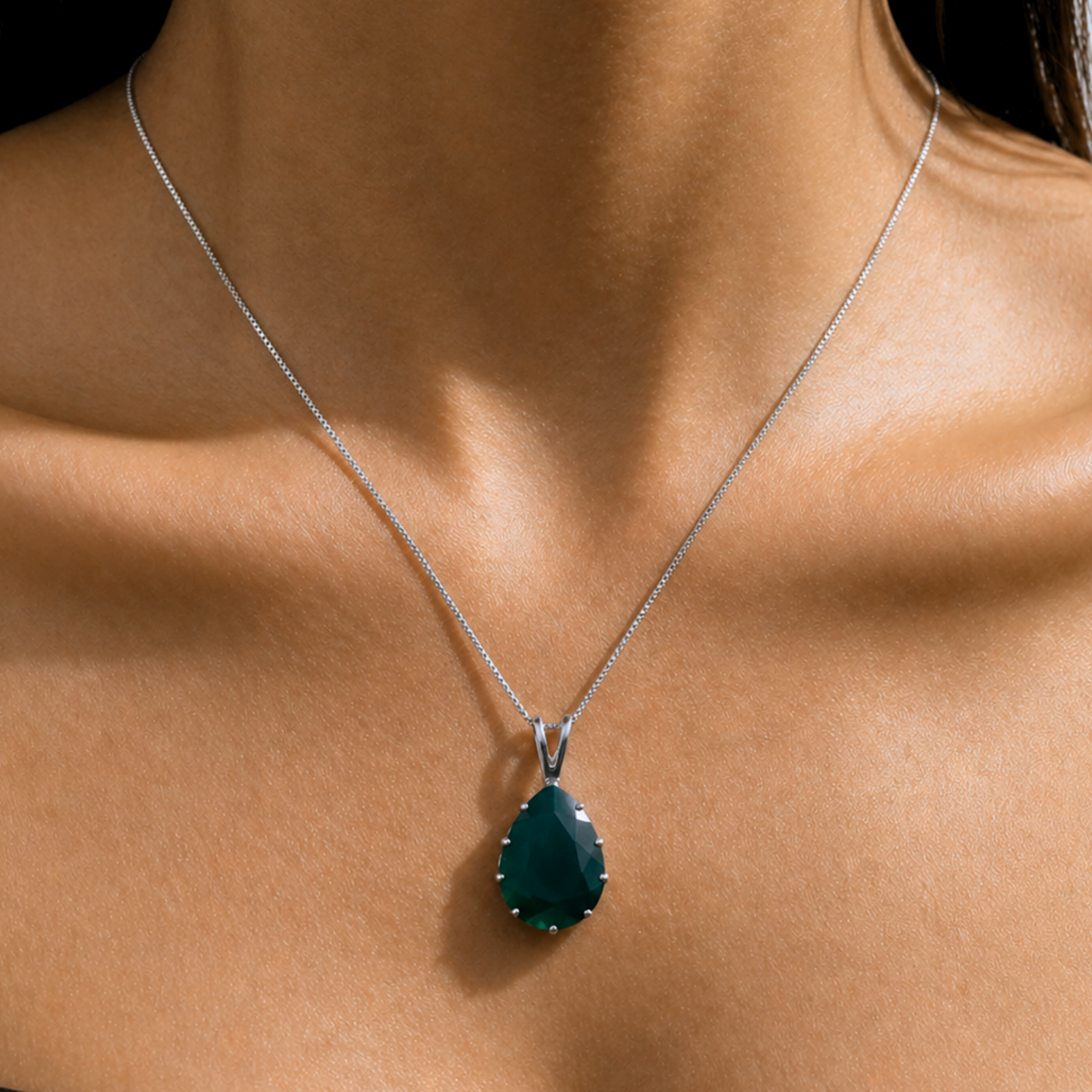 Elegant 925 Sterling Silver Emerald Pendant featuring a vibrant green emerald, ideal for May birthdays and special occasions.