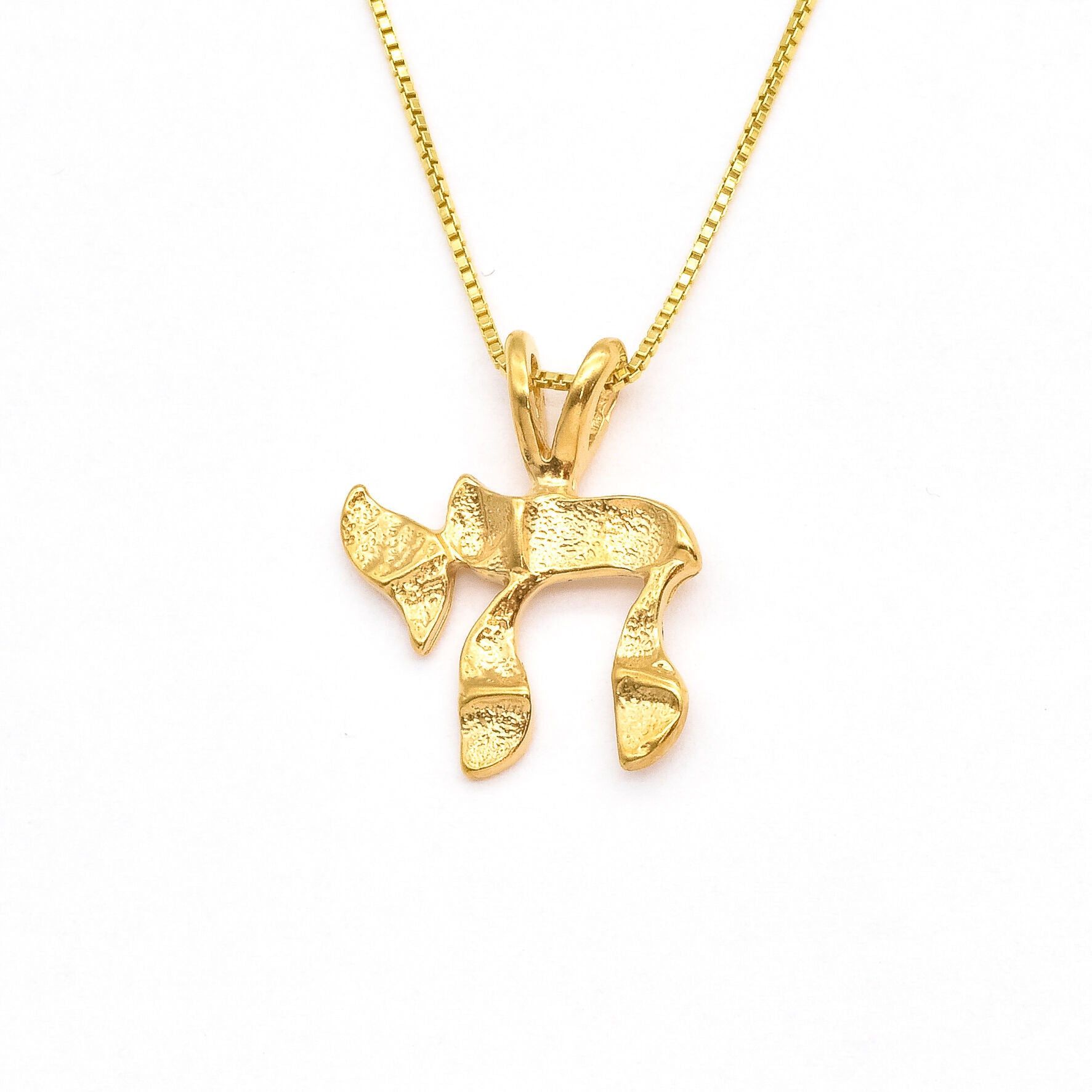 Gold Chai Pendant - Jewish Amulet Necklace - Hebrew Symbol Necklace made in 18k Gold Vermeil. Ideal for everyday wear and perfect for birthday gifting and special occasions.