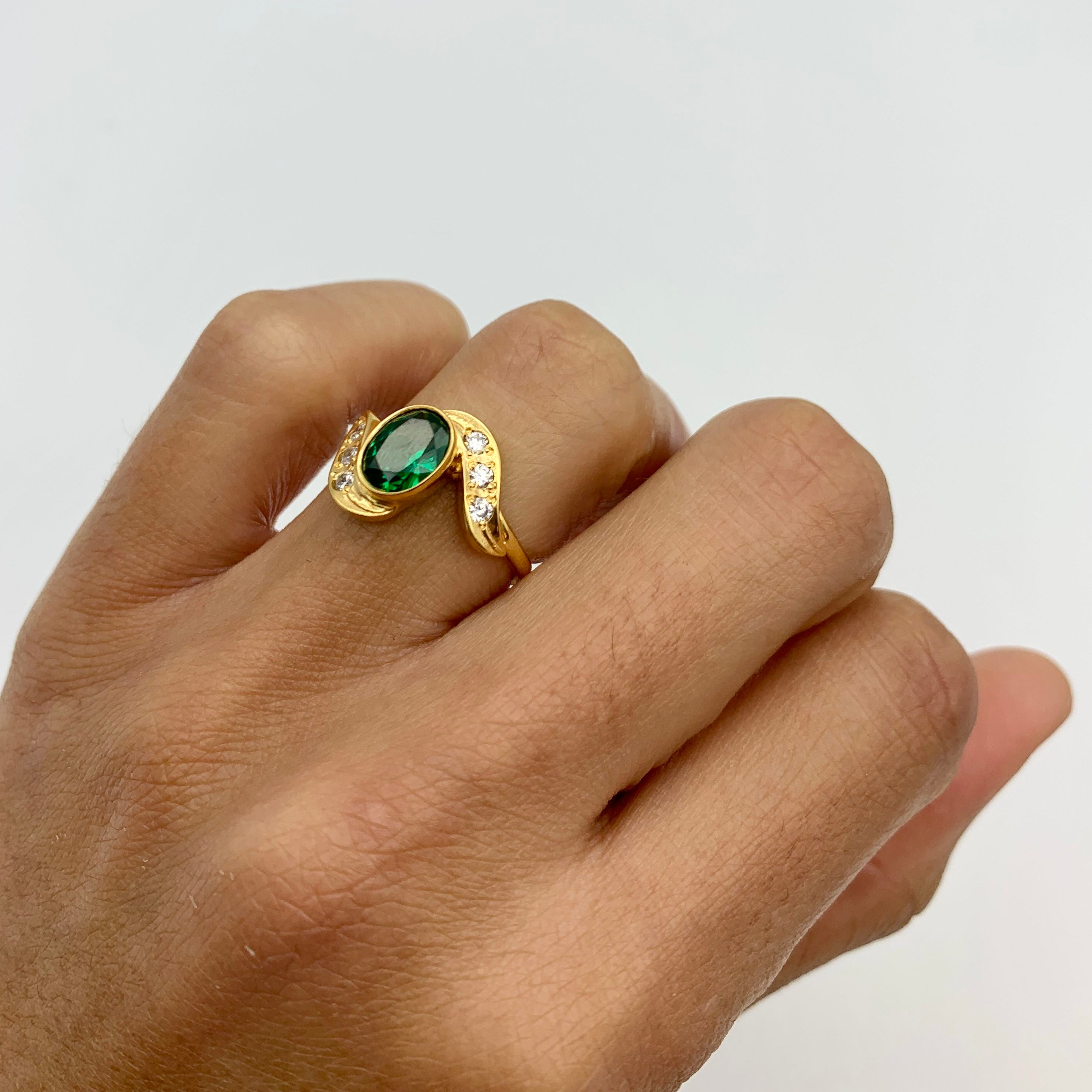Stylish 18k Gold Vermeil Emerald Ring with Oval Created Green Emerald, a perfect May birthstone gift for any occasion.
