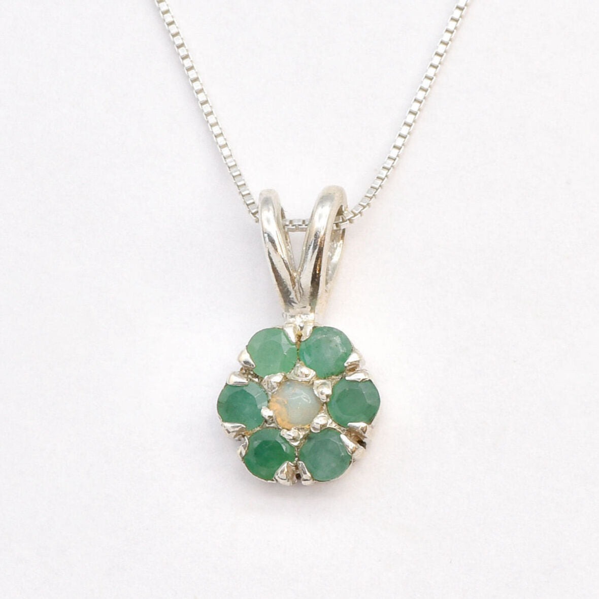 Elegant 925 Sterling Silver Natural Emerald Pendant with Cluster setting, perfect for May birthdays and meaningful gifts.