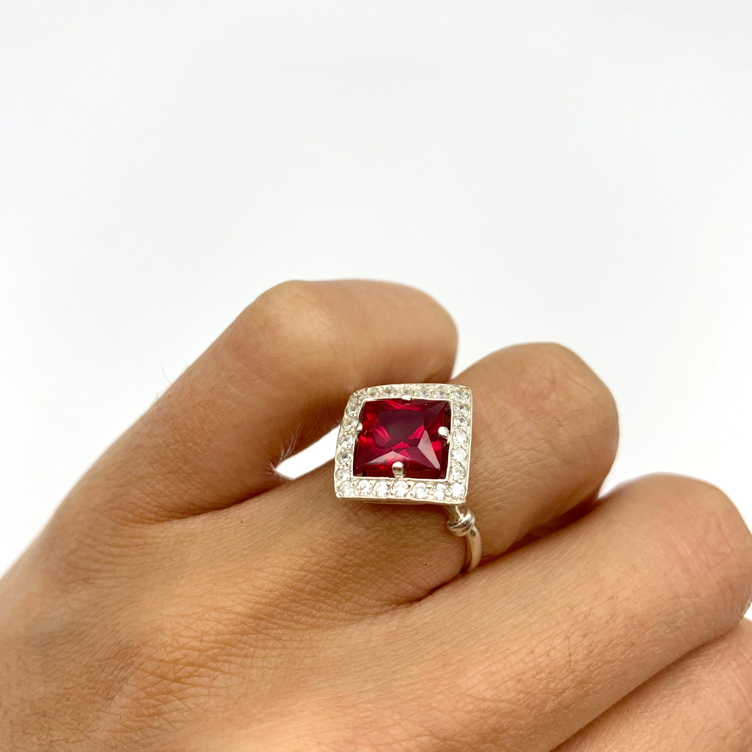 Lovely 925 Sterling Silver Ruby Ring with Halo setting, perfect July birthstone piece for special occasions and everyday wear.