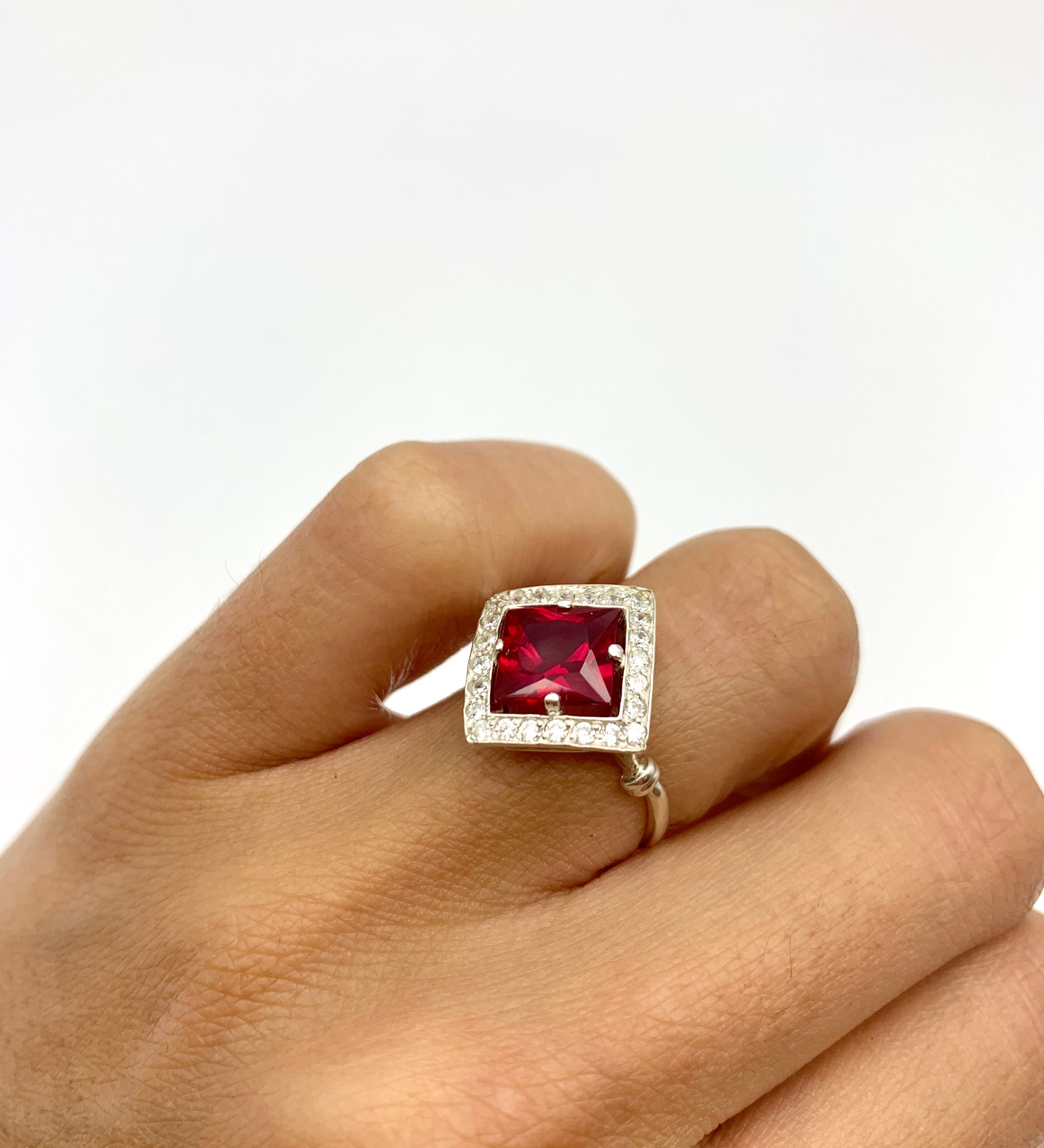 Lovely 925 Sterling Silver Ruby Ring with Halo setting, perfect July birthstone piece for special occasions and everyday wear.