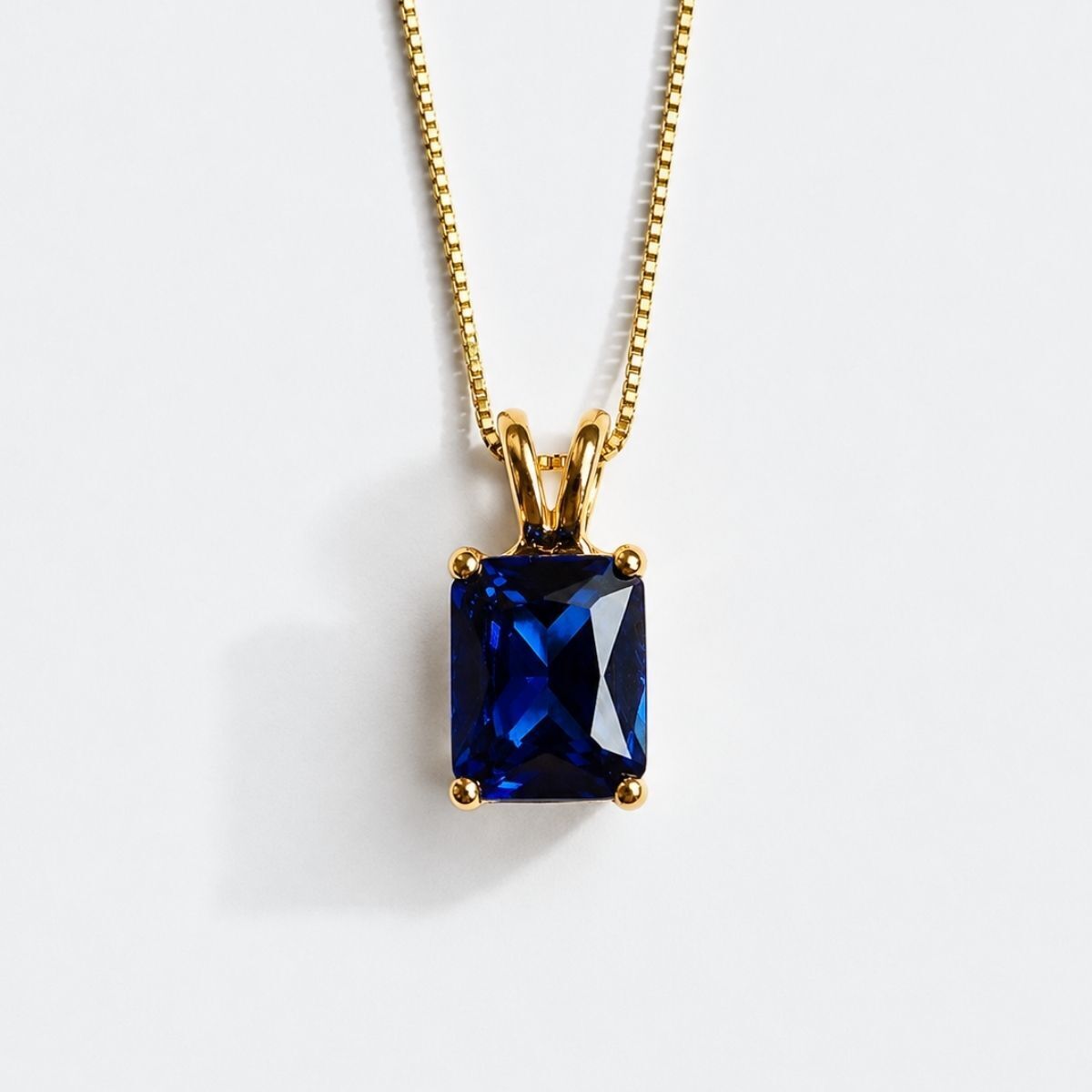 Created Sapphire Pendant made in 18k Gold Vermeil with Baguette Created Blue Sapphire in Prong setting, September Birthstone gift idea, symbolizes sincerity, truth, and faithfulness, ideal for everyday wear and perfect for birthday gifting and special occasions.