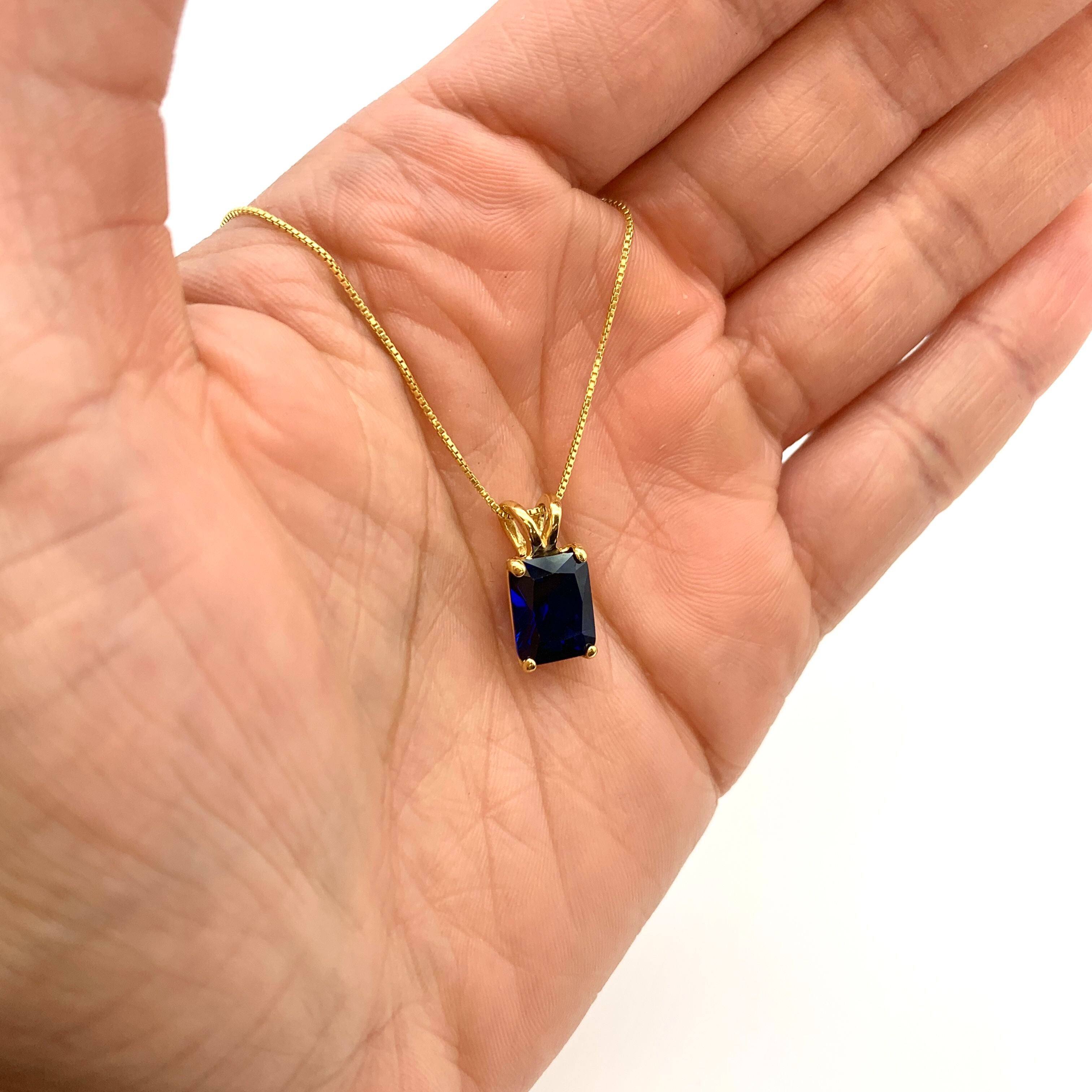 Elegant 18k Gold Vermeil Pendant featuring Baguette Created Blue Sapphire, perfect September birthstone gift for special occasions.