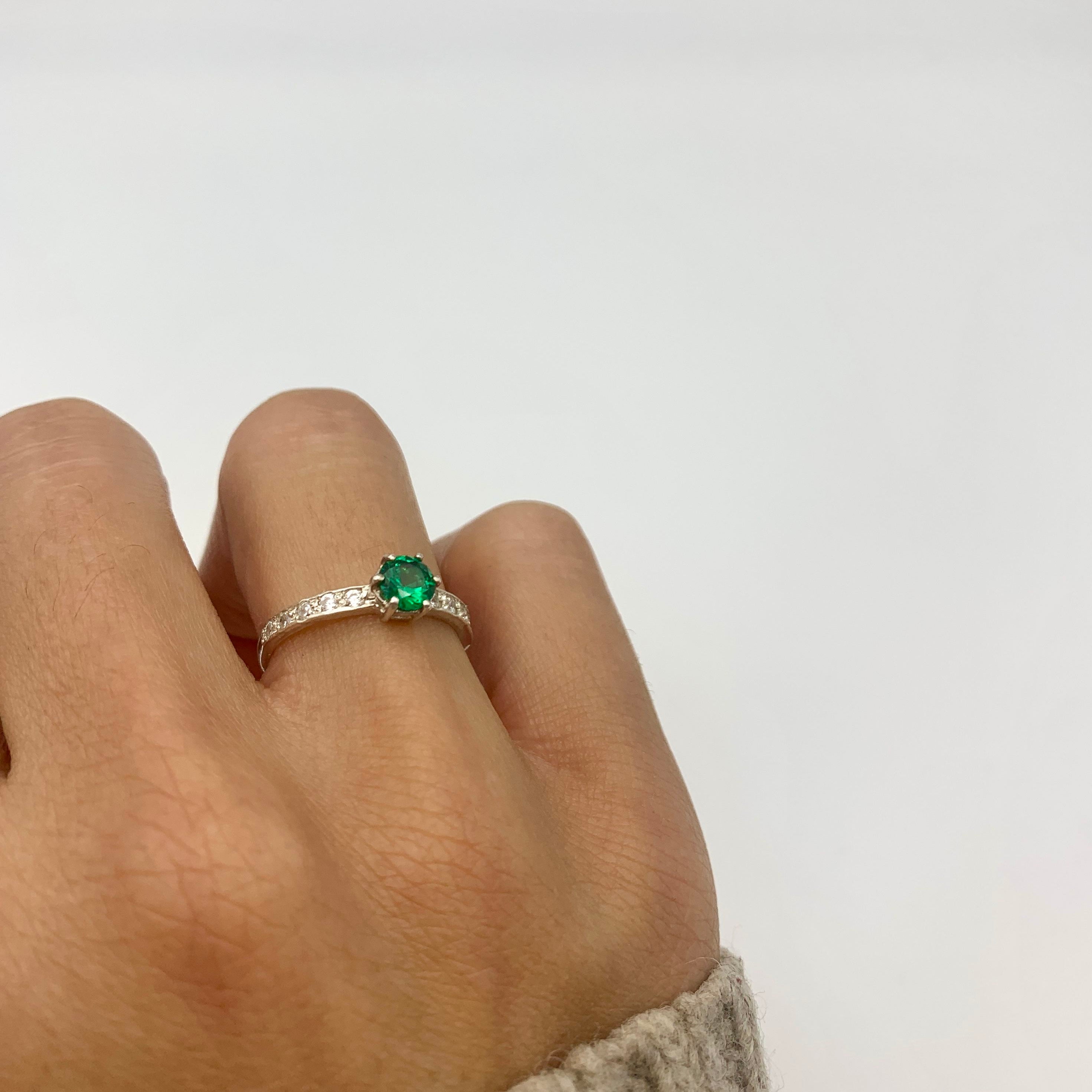 Elegant 925 Sterling Silver ring featuring a Round Created Green Emerald, perfect for May birthdays and special occasions.