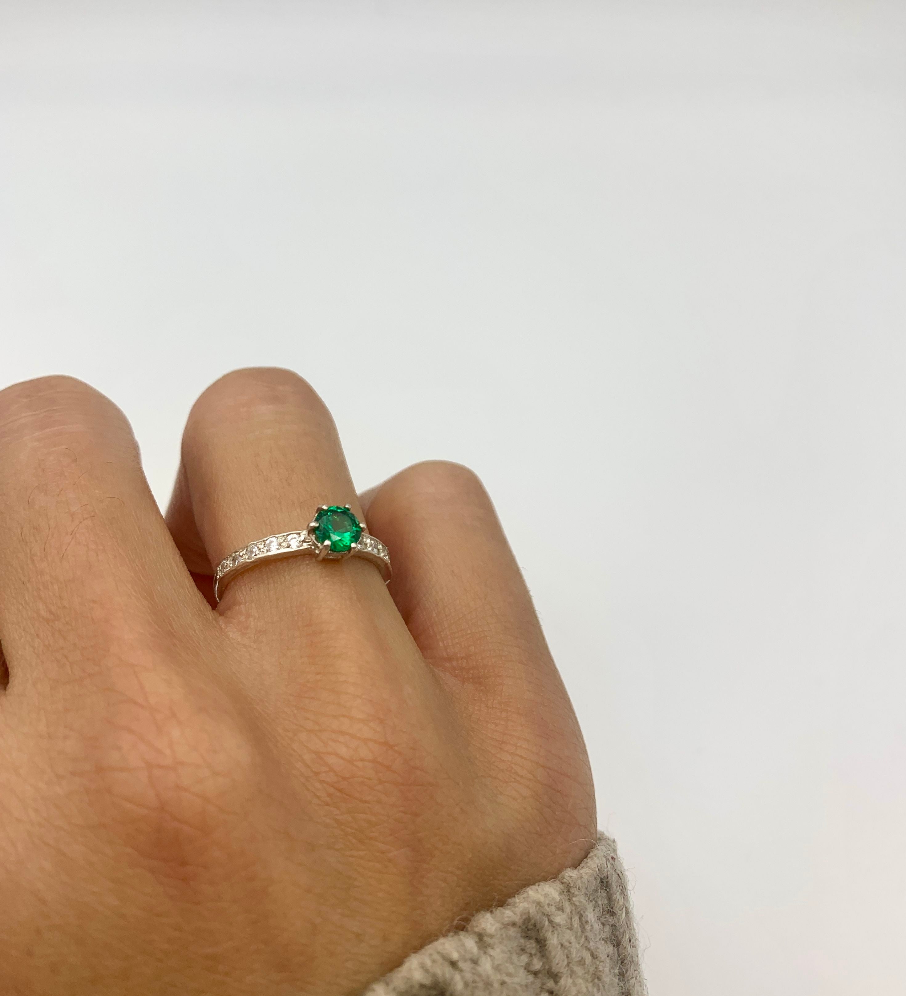 Elegant 925 Sterling Silver ring featuring a Round Created Green Emerald, perfect for May birthdays and special occasions.