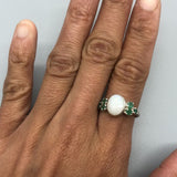 Handmade sterling silver ring with oval Ethiopian opal displaying fiery colors, an October birthstone birthday gift.