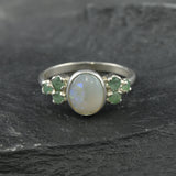 Oval Ethiopian fire opal bezel-set in 925 sterling silver, October birthstone ring symbolizing hope.
