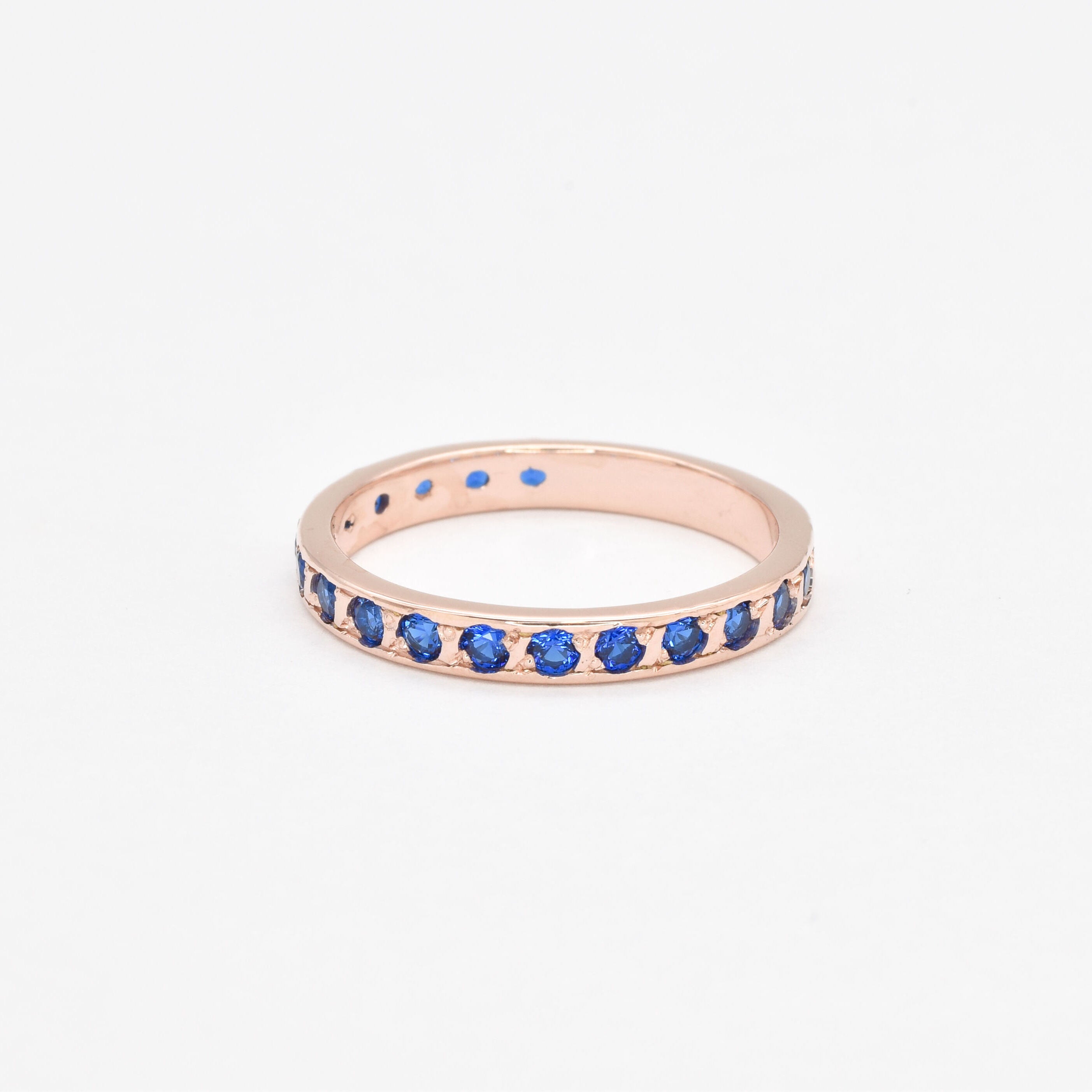 Elegant Rose Gold Vermeil ring with Round Created Blue Sapphire, symbolizing sincerity and truth, ideal for daily wear.