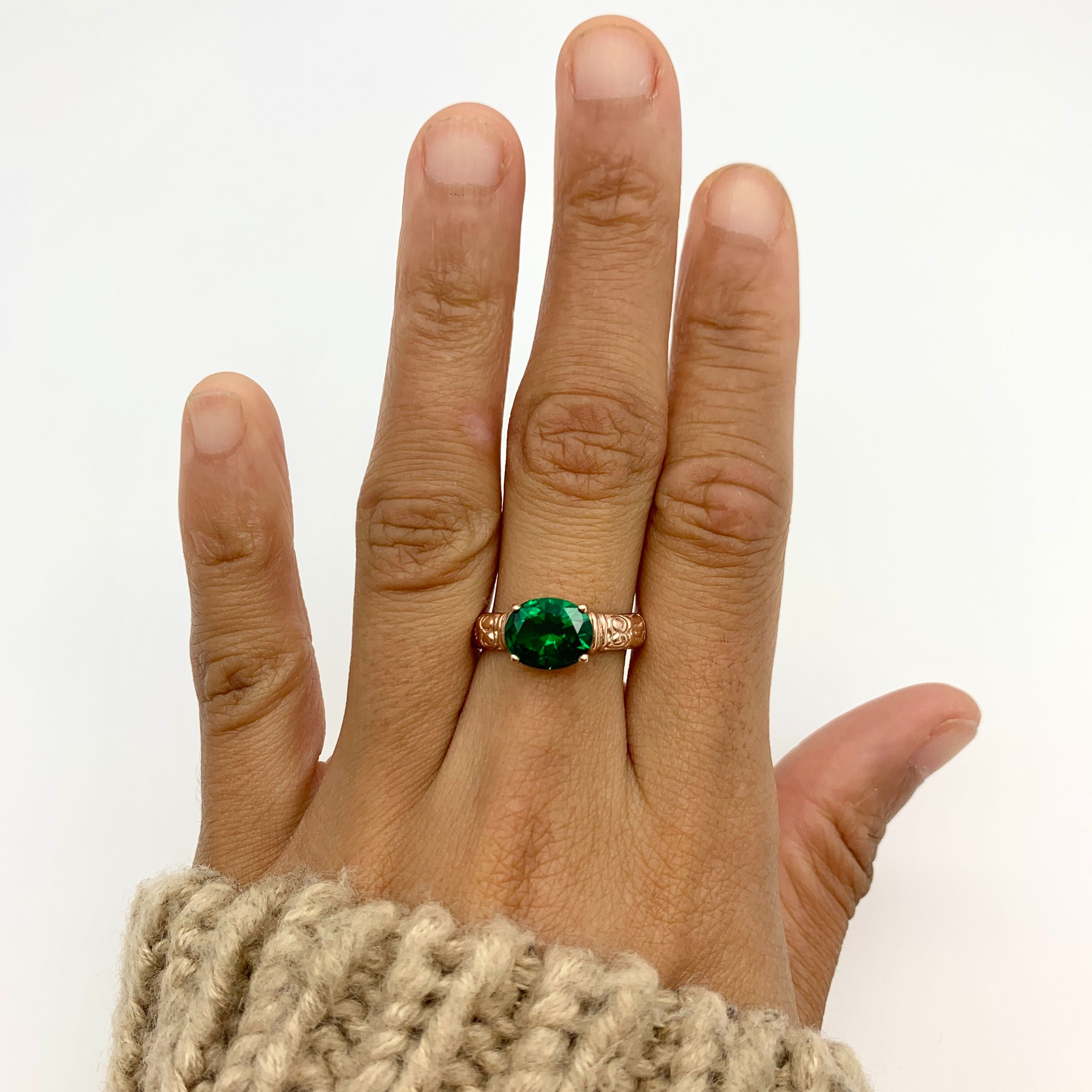 Stunning Rose Gold Vermeil Ring with Oval Created Green Emerald, a timeless piece for May birthdays and special celebrations.