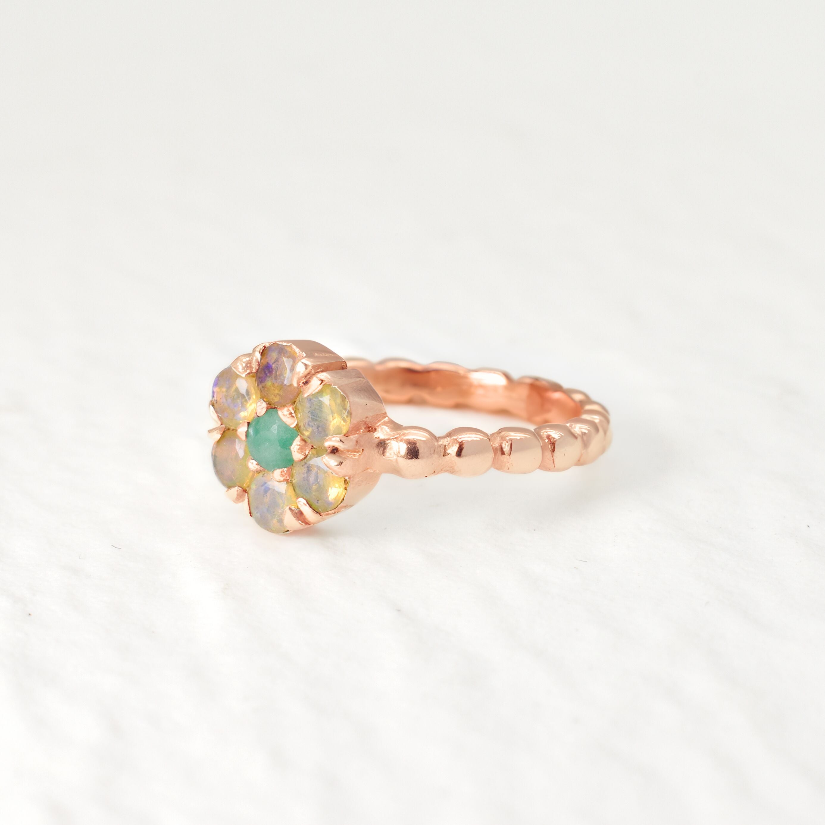 Beautiful Rose Gold Opal Flower Ring, perfect for adding a touch of elegance to any outfit and a thoughtful gift for loved ones.