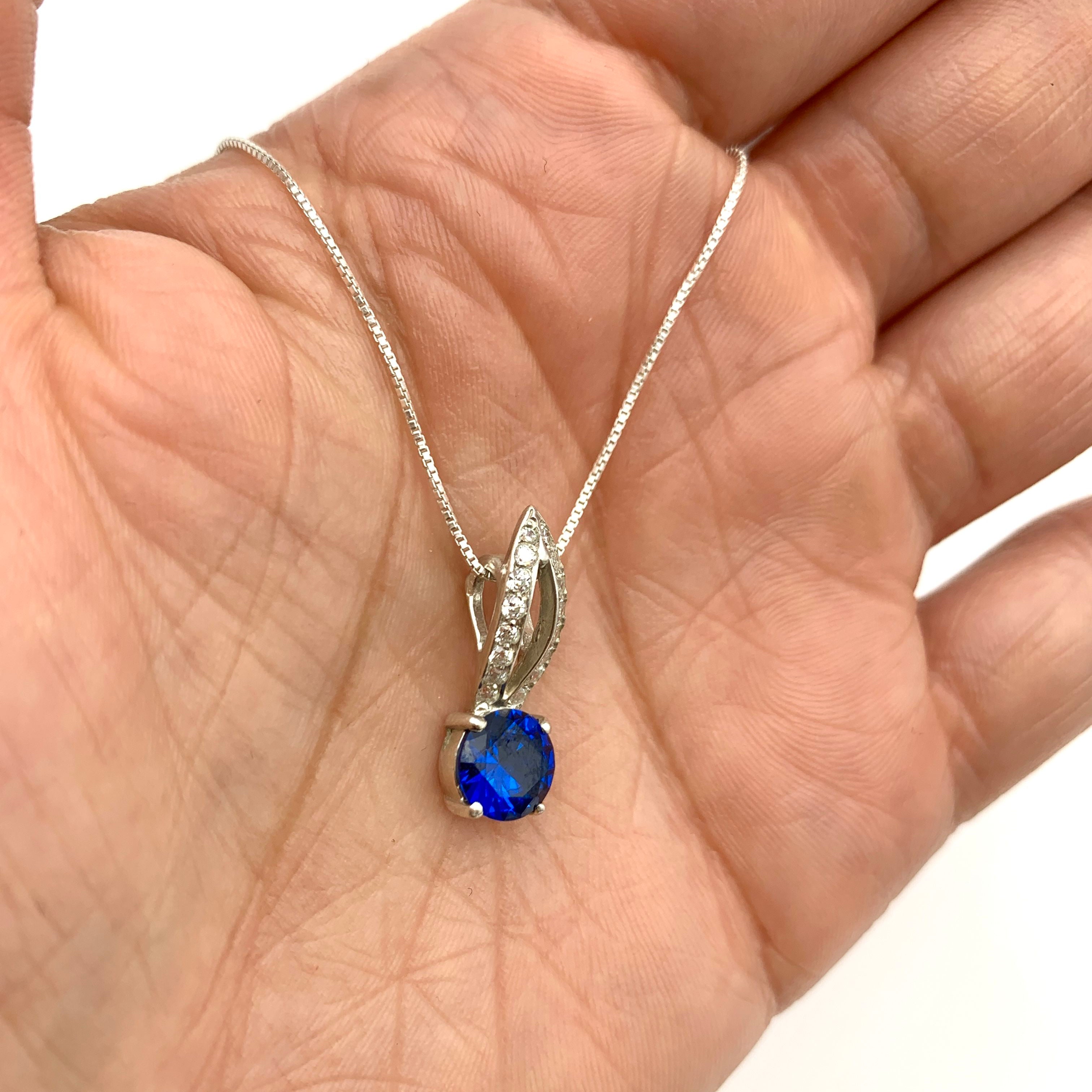 Sapphire Pendant in 925 Sterling Silver, featuring a round blue sapphire, perfect for September birthdays and special occasions.