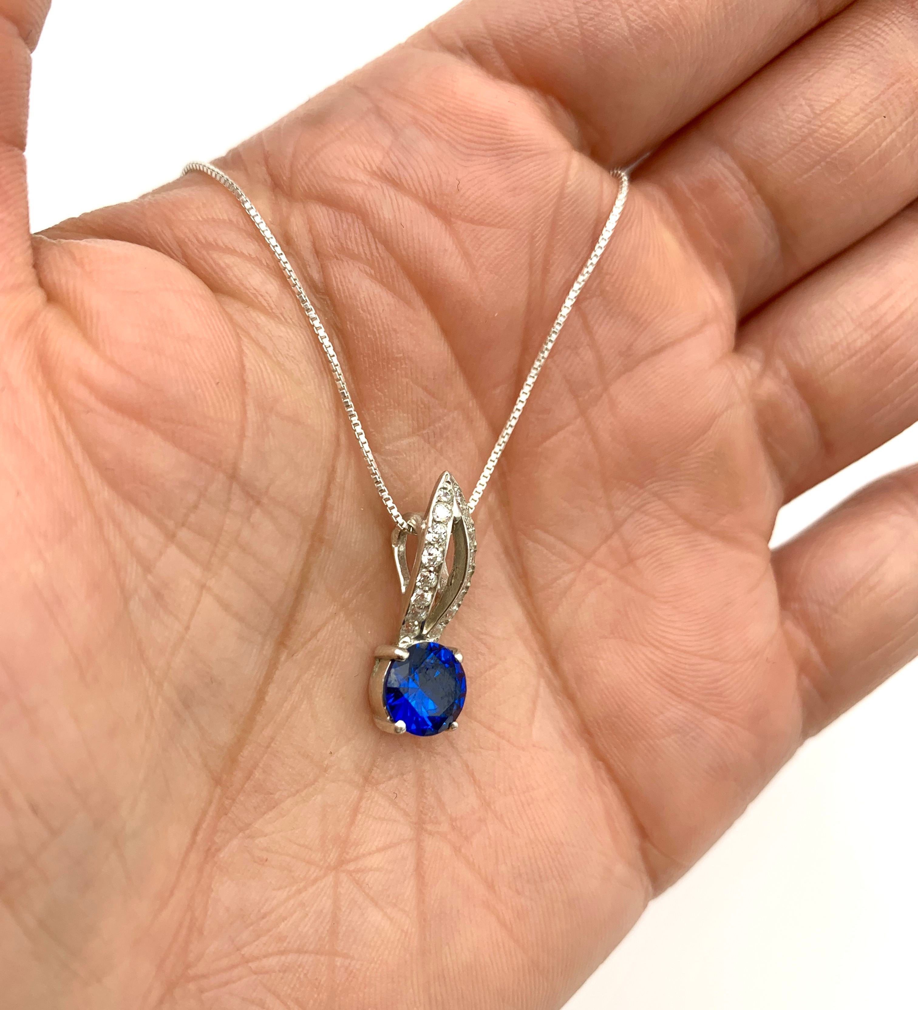 Sapphire Pendant in 925 Sterling Silver, featuring a round blue sapphire, perfect for September birthdays and special occasions.
