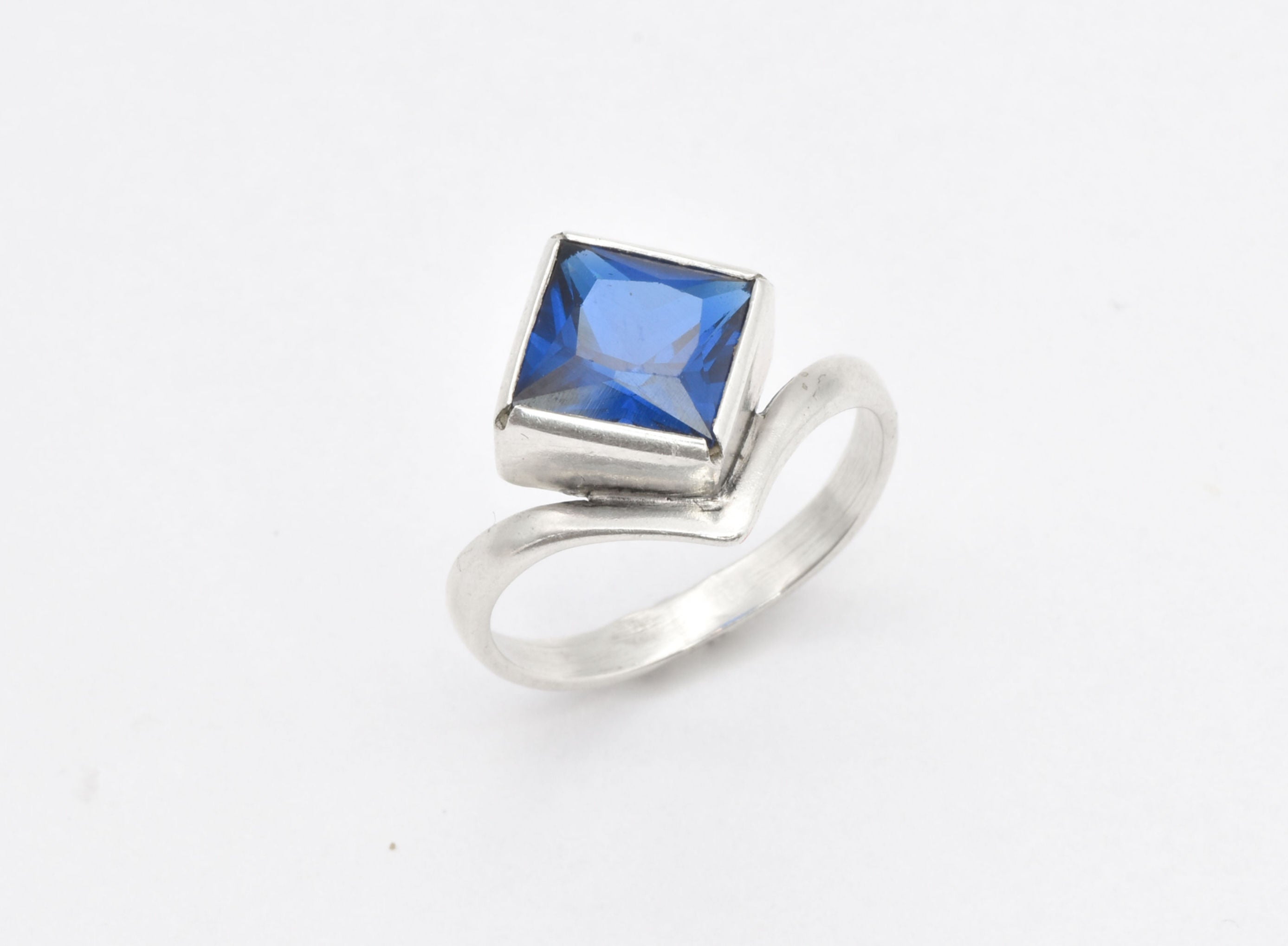 Created Sapphire Ring made in 925 Sterling Silver with Square Created Blue Sapphire in Bezel setting, September Birthstone gift idea, symbolizes sincerity, truth, and faithfulness, ideal for everyday wear and perfect for birthday gifting and special occasions.