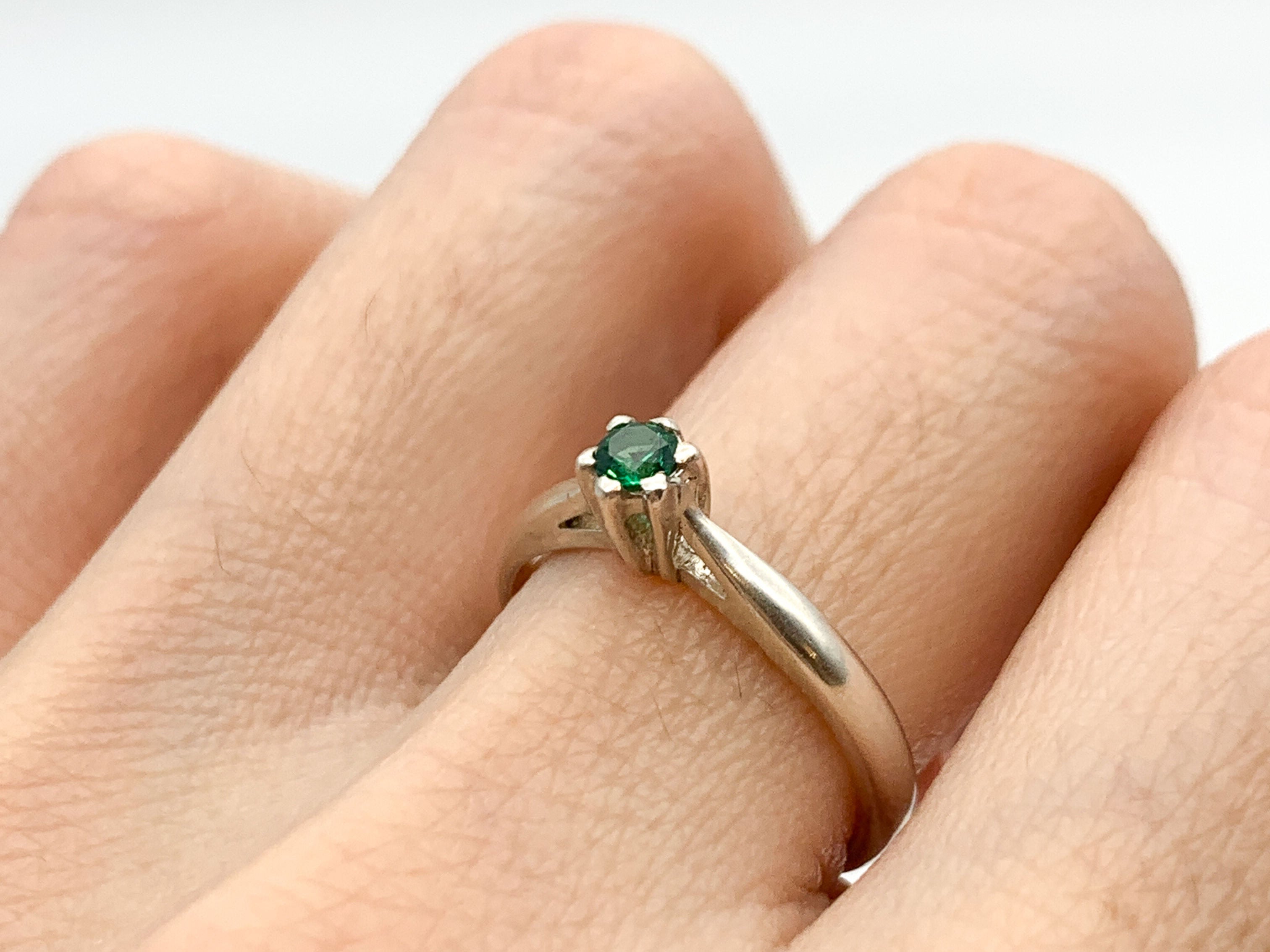 Elegant 925 Sterling Silver ring featuring a Round Created Green Emerald, perfect for birthdays and special occasions.