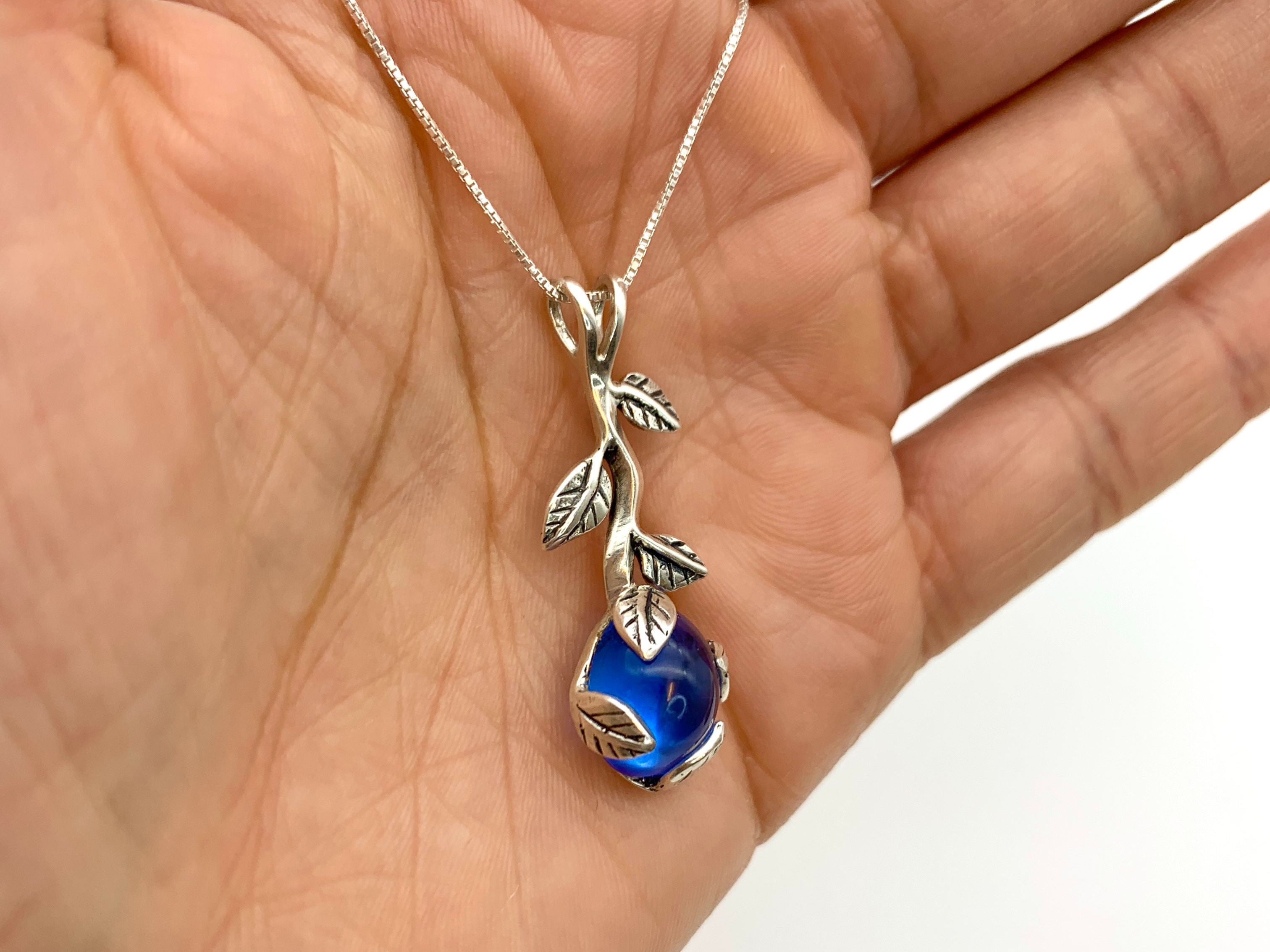 Created Sapphire Pendant in 925 Sterling Silver with Baguette Blue Sapphire, a thoughtful September birthday gift.