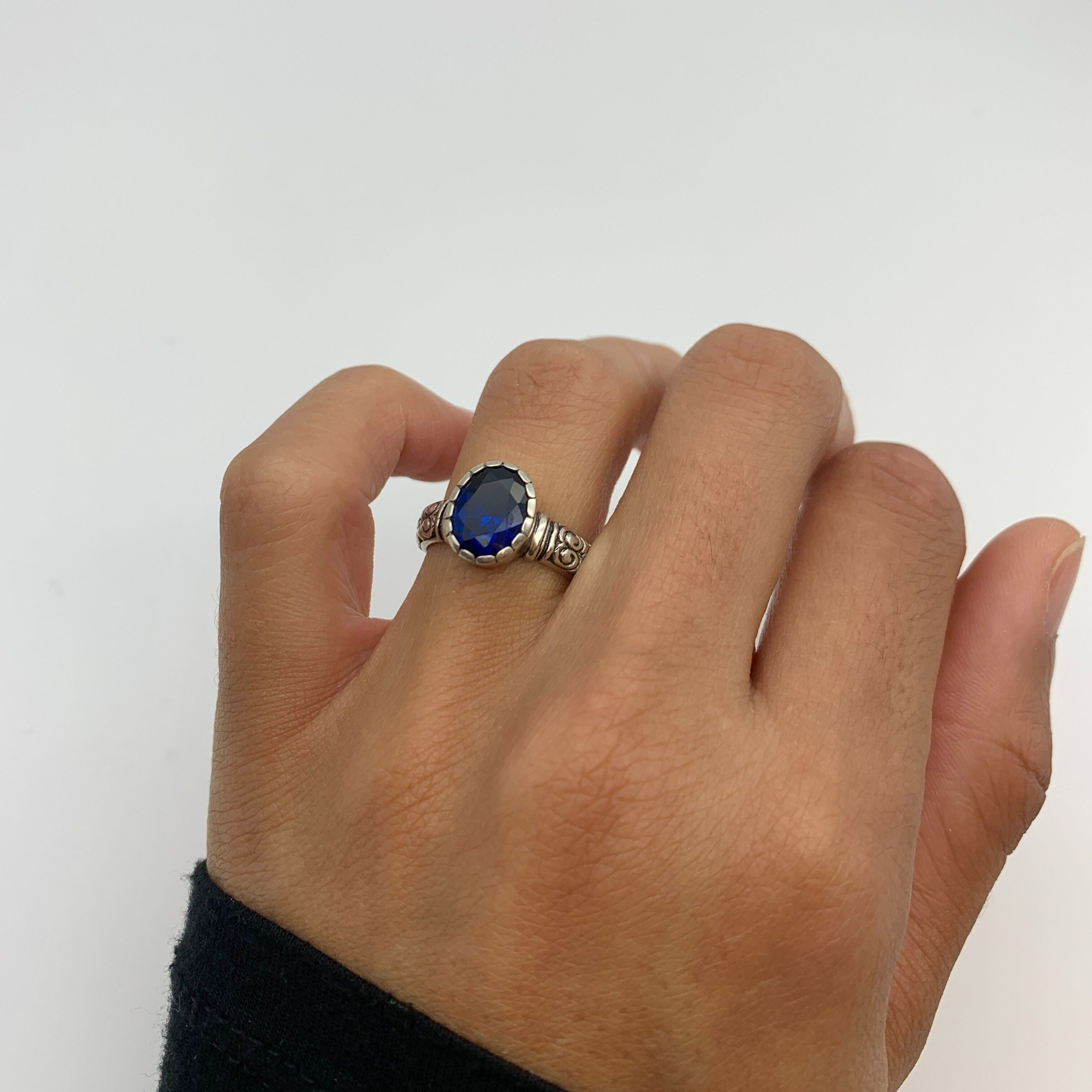 Sapphire ring in 925 sterling silver with oval created blue sapphire, perfect for September birthdays and special occasions.